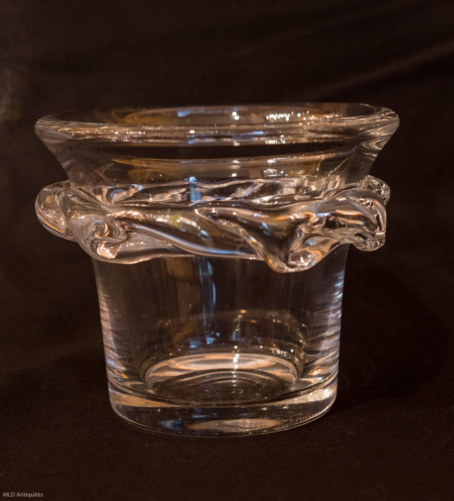 Lovely, Sorcy, crystal vase signed Daum France & Lorraine cross at the bottom of the vase.
Fantastic perfect original condition,
circa 1960.
Measures: H 5.11 in, D 5.90 in.