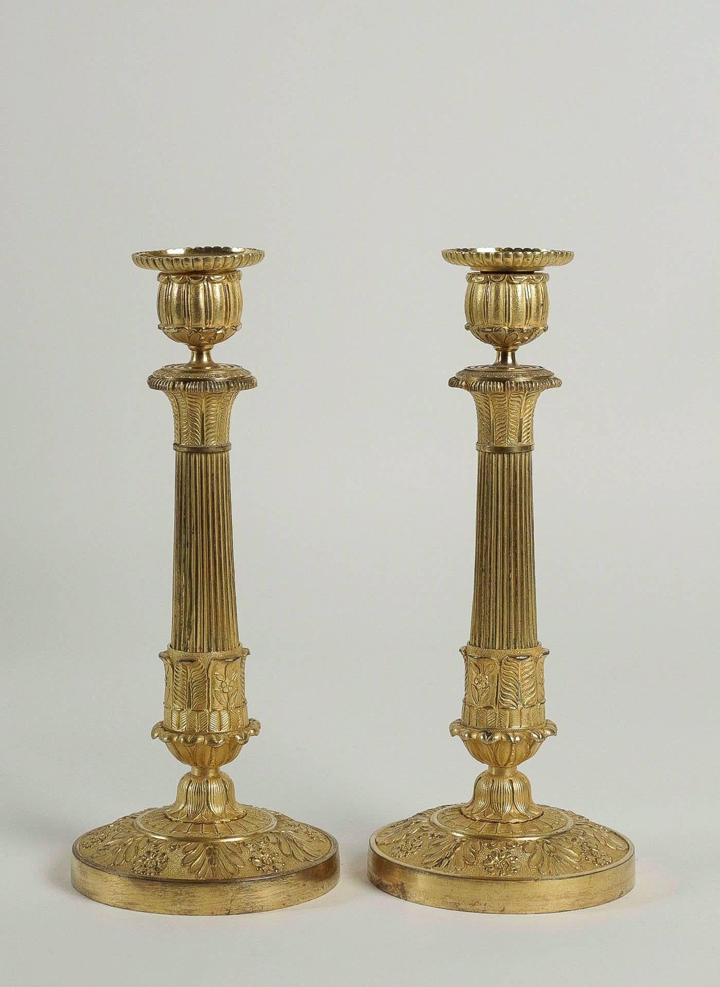 Gilt French Empire Period, Pair of Chiseled Ormolu Candlesticks, circa 1810