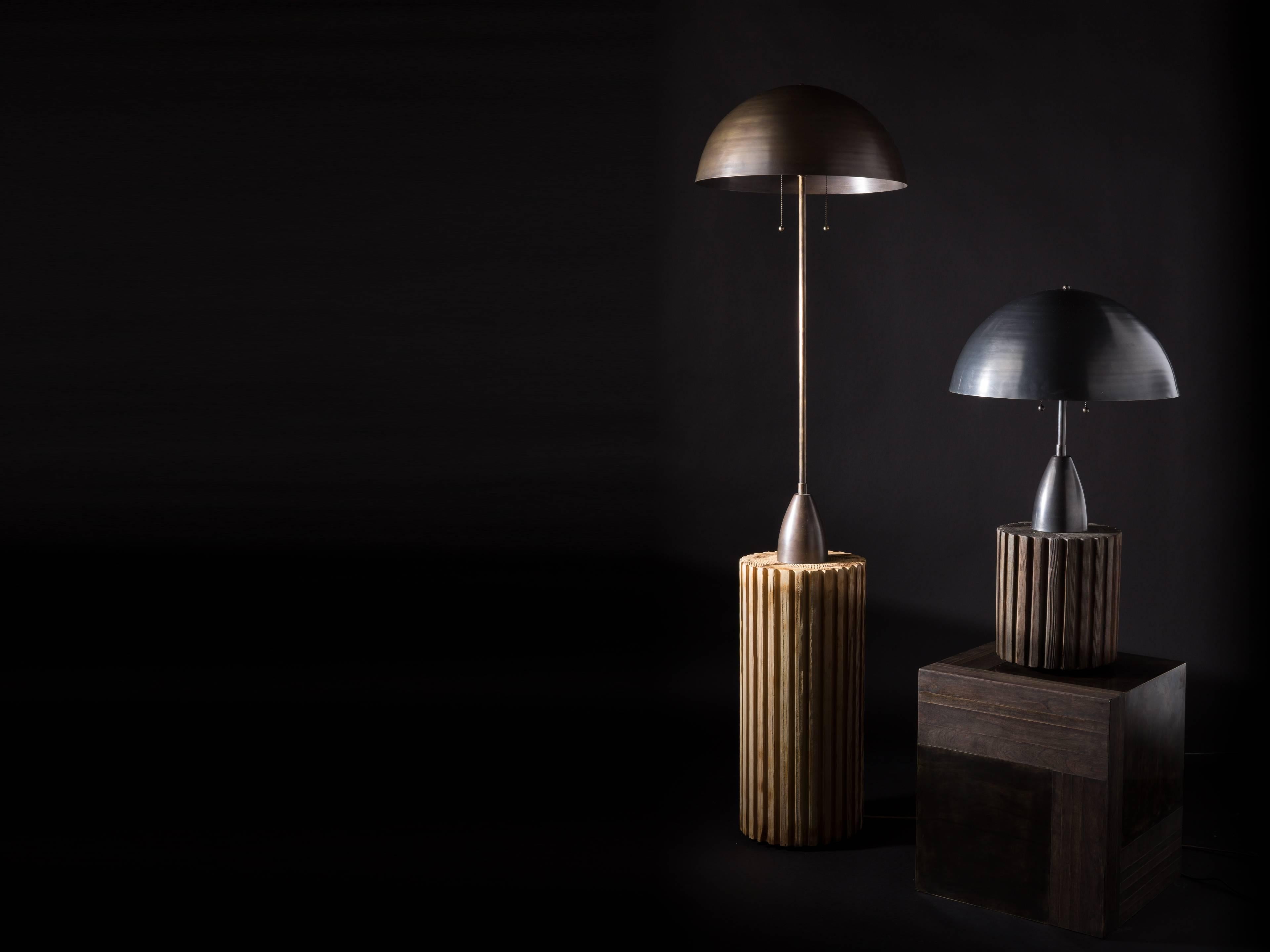 Inspired by found architectural salvage, these lamps are handcrafted from ash and brass. Available with bleached or blackened wood.
         