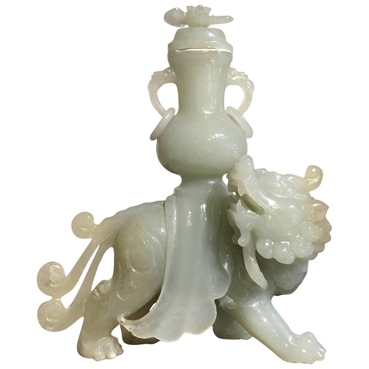 Chinese Carved Jade Figure of a Buddhistic Lion Supporting a Vase For Sale