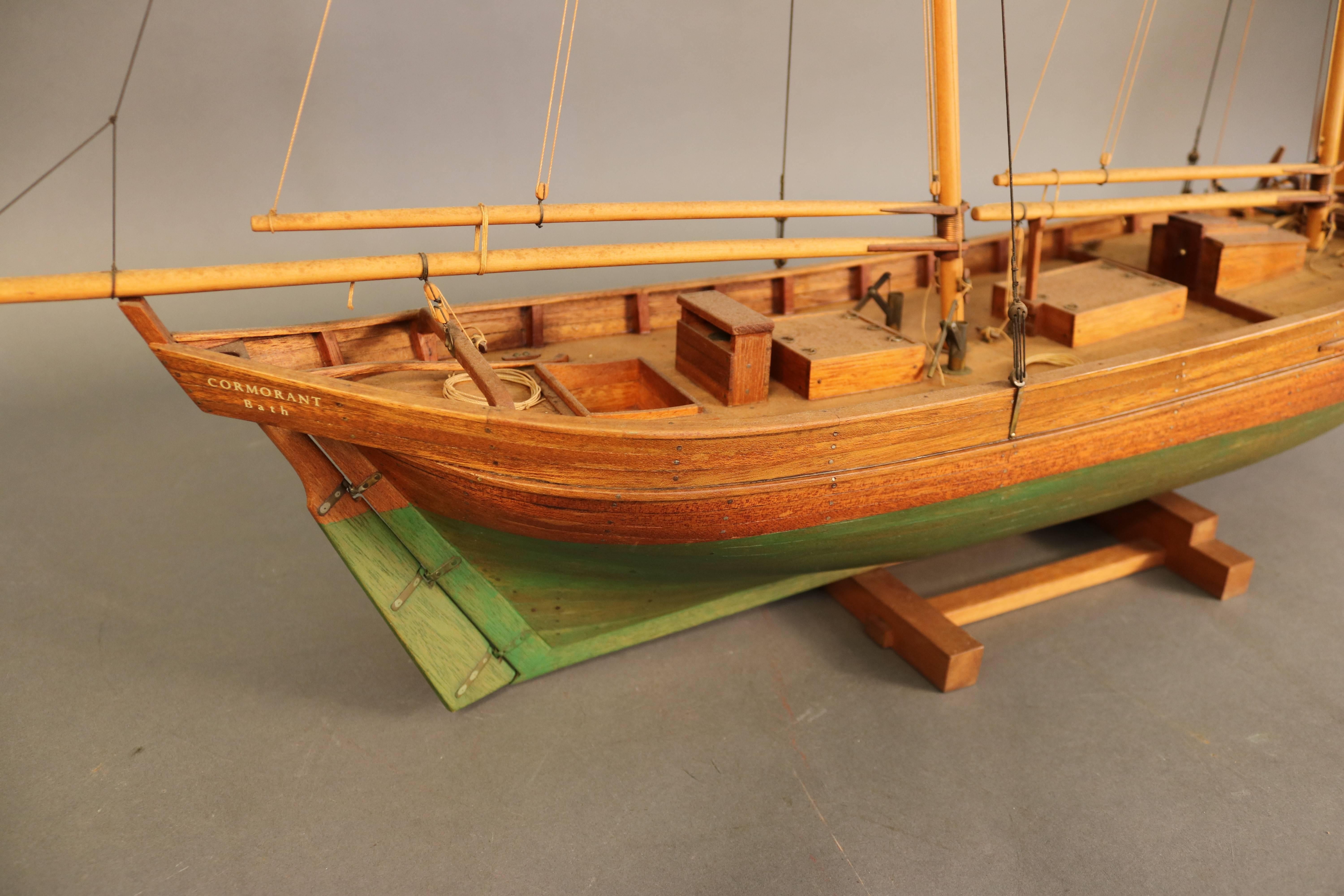 Fine model of the Eastport Pinky "Cormorant" by Cape Cod model master Robert Innis (1893-1983). Innis was a talented builder who rigged ship models with the use of a prosthesis. His ship models are in the Hart Nautical Museum at the