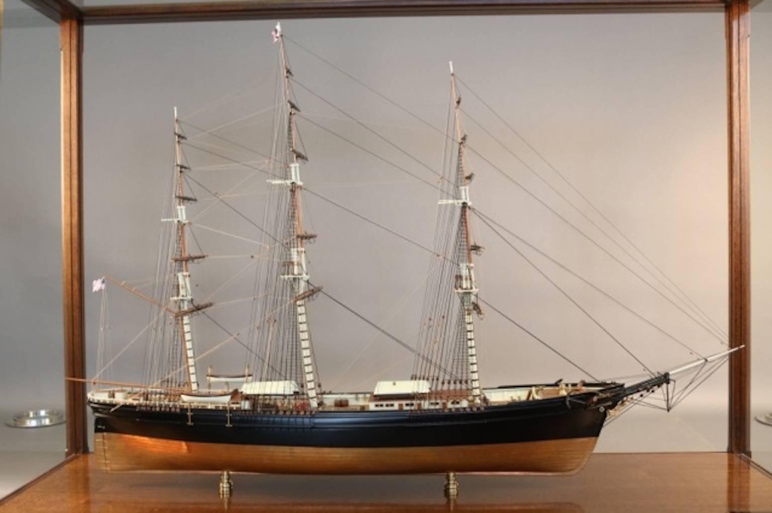Highest quality model of the American clipper ship "Flying Cloud". Planked deck with expertly executed cabins, hatches, skylights, etc. Hull is copper sheathed below the waterline and painted black above. Intricately rigged with all
