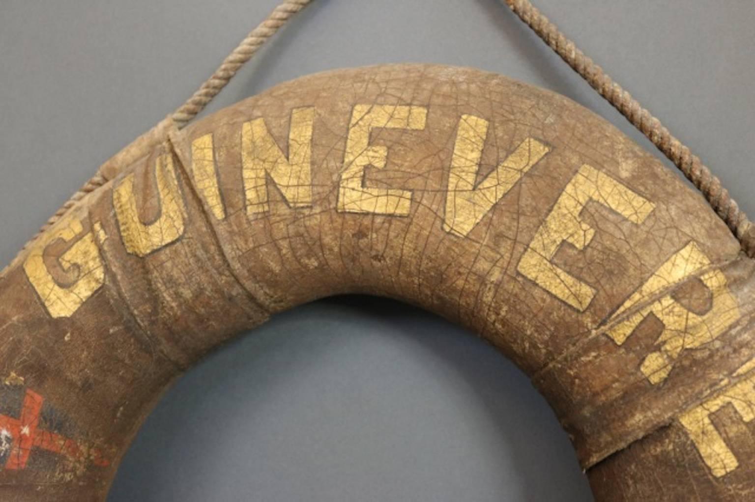Very rare life ring from the New York Yacht Club yacht "Guinevere" with NYYC and owner's burgee. Canvas covered cork with rope handles.
Dimensions: 23" diameter.
Weight: 6lbs.
