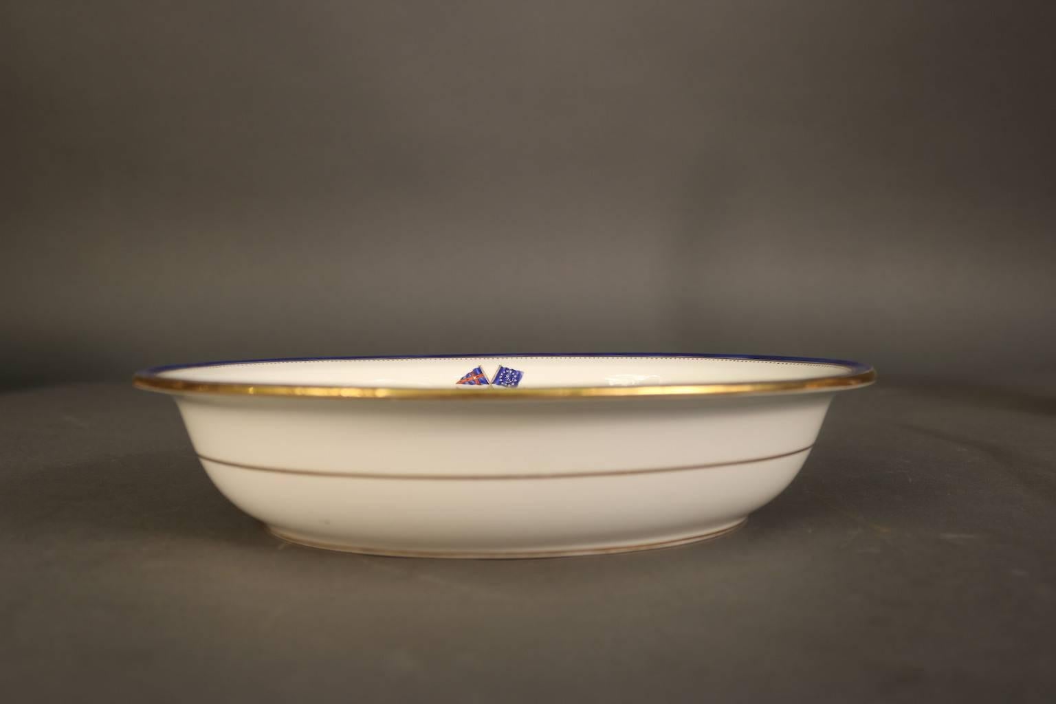 Personal dinnerware made exclusively for J. Pierpont Morgan (1837-1913) for use aboard his Flagship Corsair, built in 1890. This 8” Flagship Corsair Vegetable Side Plate Bowl by Minton's has the J. Pierpont Morgan signature navy blue trim with gold