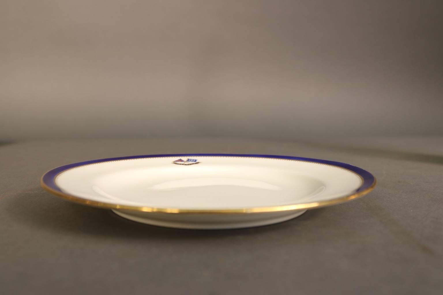 Personal dinnerware made exclusively for J. Pierpont Morgan (1837-1913) for use aboard his personal steam yacht corsair, built in 1890. This 8” Luncheon plate by Minton's has the J. Pierpont Morgan signature navy blue trim with gold accents. Reverse