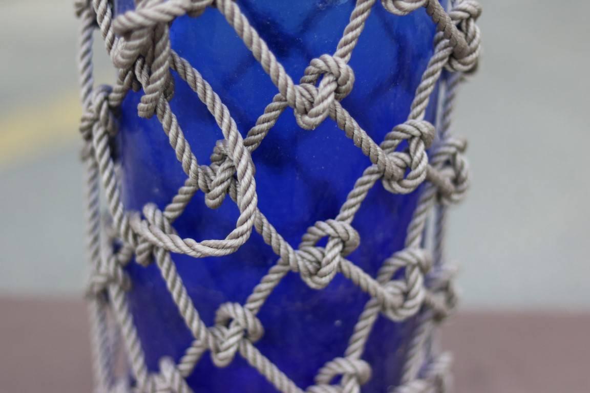 Saki jug with knotted rope. Cobalt blue. Dimensions: 21" H.