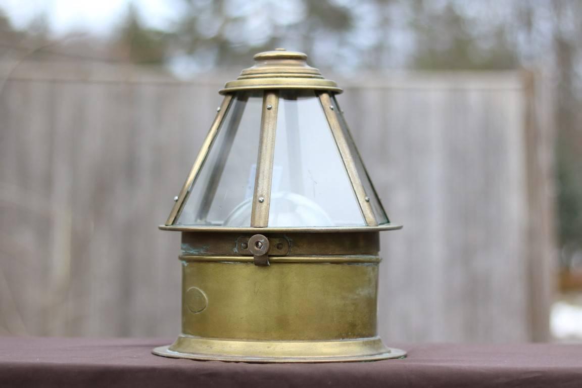 Brass skylight binnacle by Perko with ES Ritchie compass with hood. Dimensions: 12" H x 10" W.