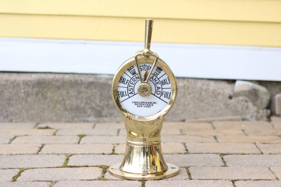 Brass Charles Cory telegraph. Traditional English commands, no chime. 

Dimensions: 13" H (without handle), 17" H (with handle) x 7" face diam.

 