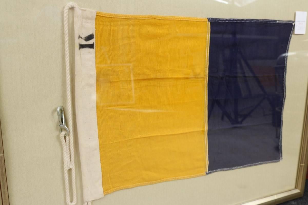 Authentic linen signal flag, signaling letter R. blue and yellow. Matted and framed. Dimensions: 20" H x 26" L.