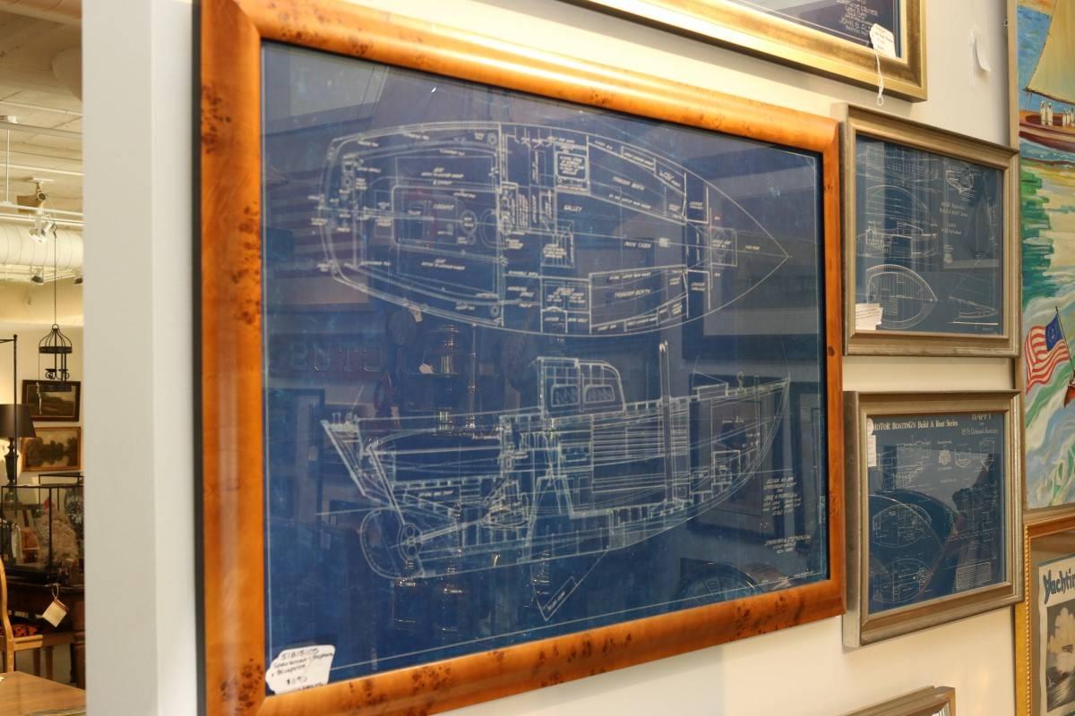 Sparkman and Stevens blueprint of a sloop. Framed in burl wood. Dimensions: 27" H x 40" L.
