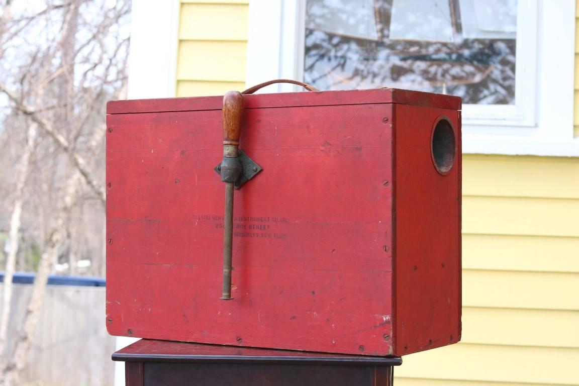 Ship's fog Horn by BALCO. Crank handle, leather carry strap, and painted red. Stamped "Balco Fog Horn No. 1".

Dimensions: 21" L x 9" W x 15" H.