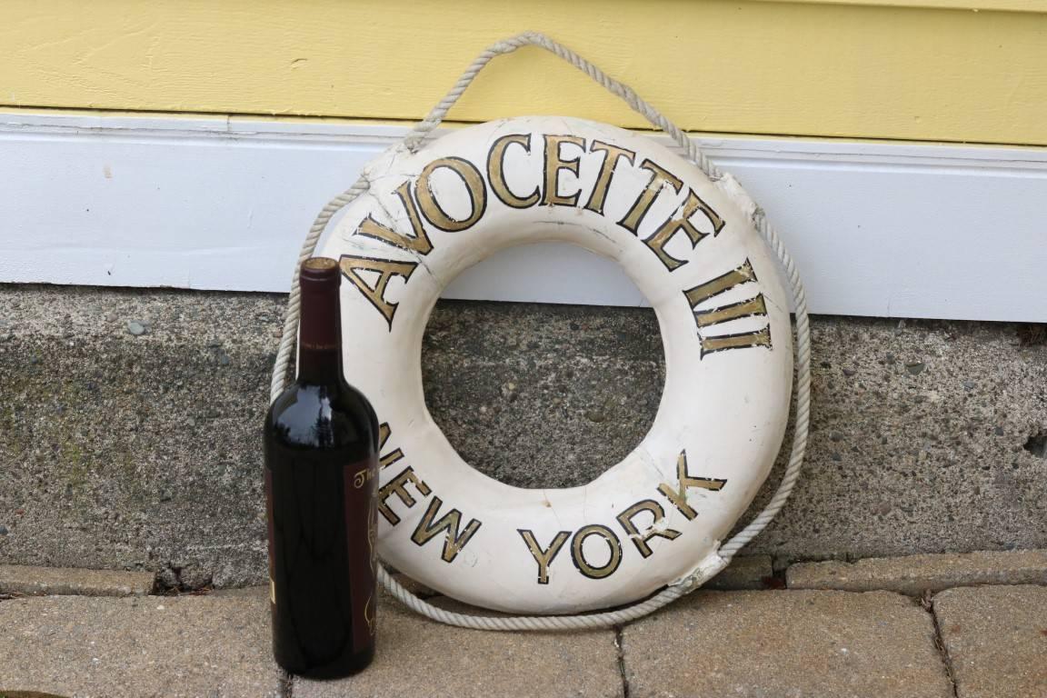 Authentic life ring of unusual weight reading "Avocette III New York". Rope handle. 

Dimensions: 14" diameter.