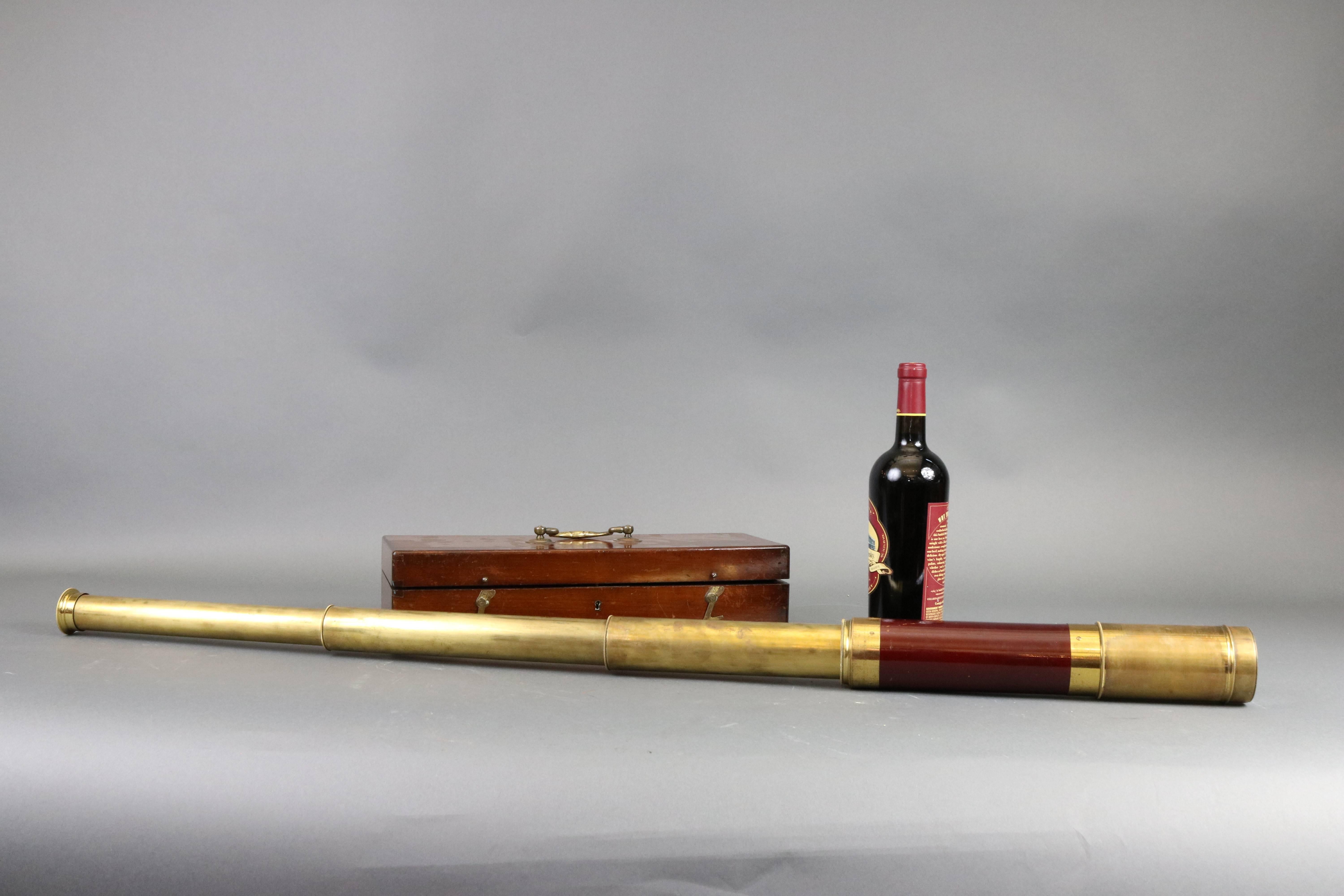 Late 18th-19th century three-draw spyglass signed "Maison de L'Ingr Chevalier Optique; Place du Pont Neuf 15, Paris" on the small focus tube. The spyglass has a wood body, brass end fittings, extending shade, lens covers, and secondary