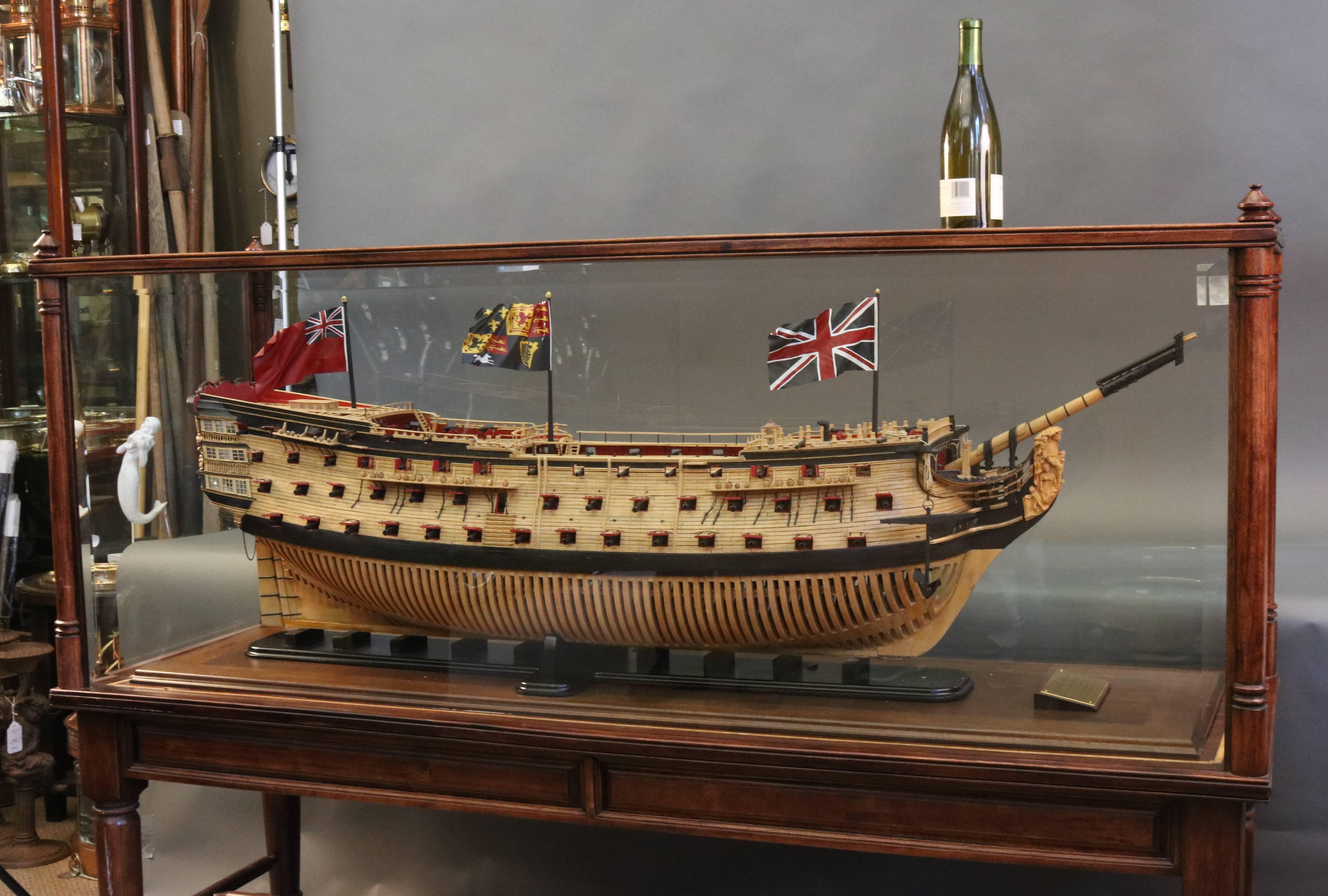 "Admiralty style ship model of the HMS ""Royal Sovereign"" by master modeler Robert Bruckshaw of Ohio. The model is built as was the original ship showing framing, decks, guns, etc. Pennants fly from flagstaffs. Deck details