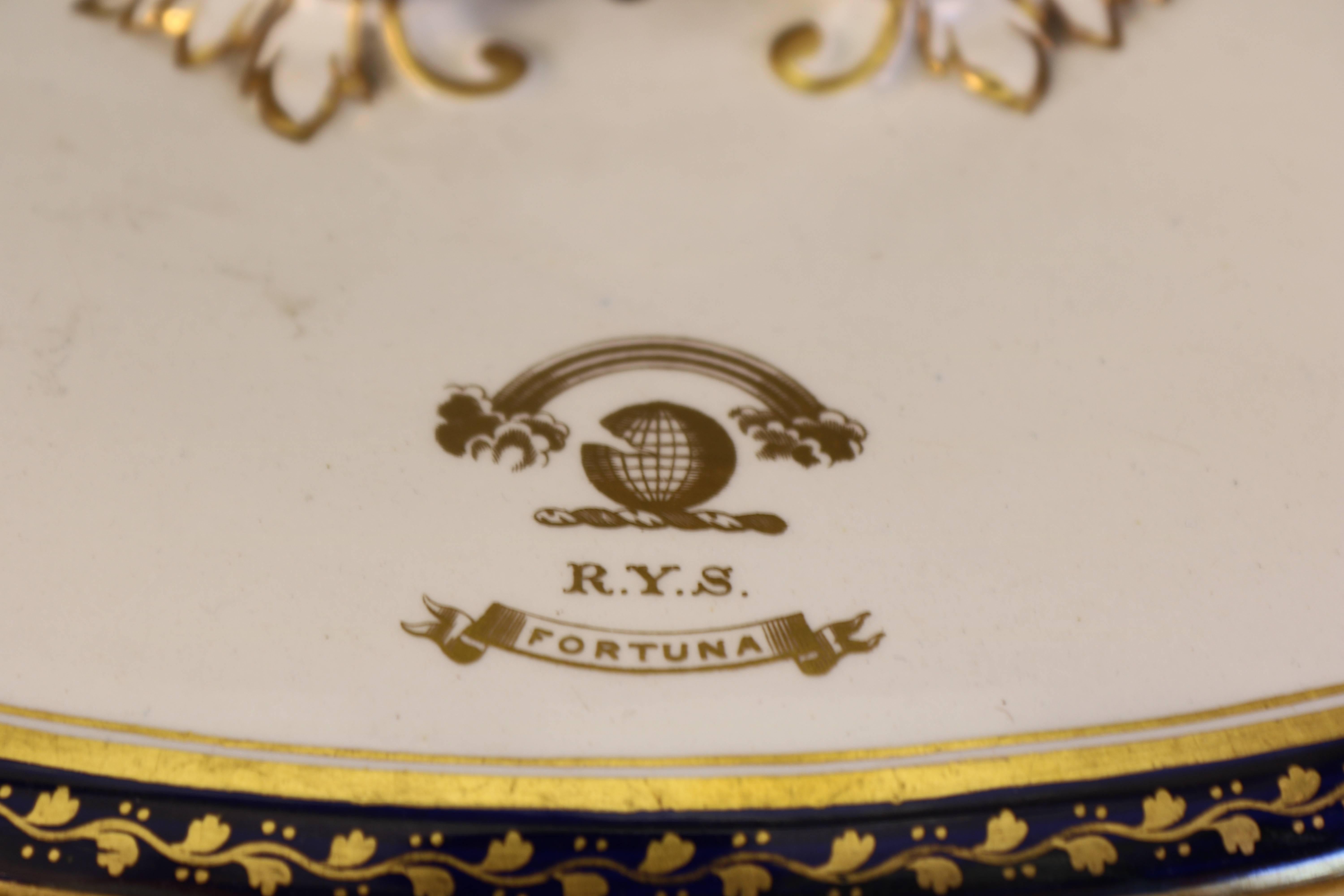 Covered tureen with cover and raised bottom decorated with "RYS Fortuna" on a gold leaf banner. The RYS Fortuna was a wooden schooner built for Adrian Elias Hope (1845-1919) by G. Inman at Lymington, circa 1876. She was registered at 192