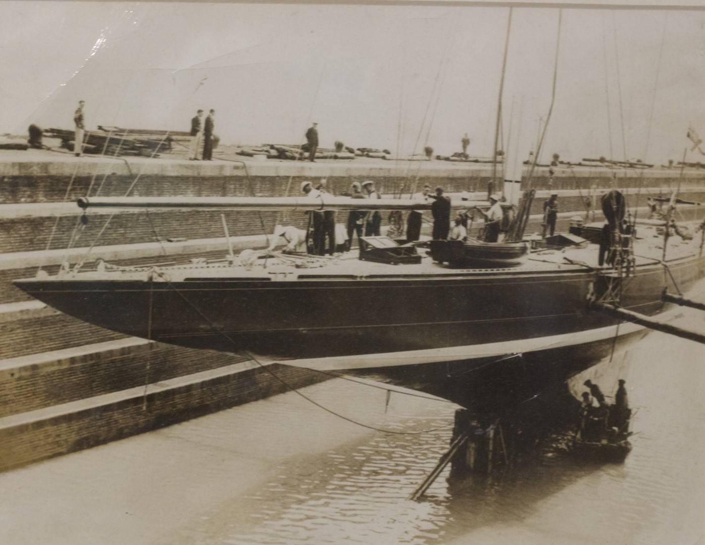 Authentic press photo of the Endeavour, circa 1934. Photos from article announcing years America's Cup with challenger show in dry-dock at Southampton England. Matted and framed. Dimensions: 13