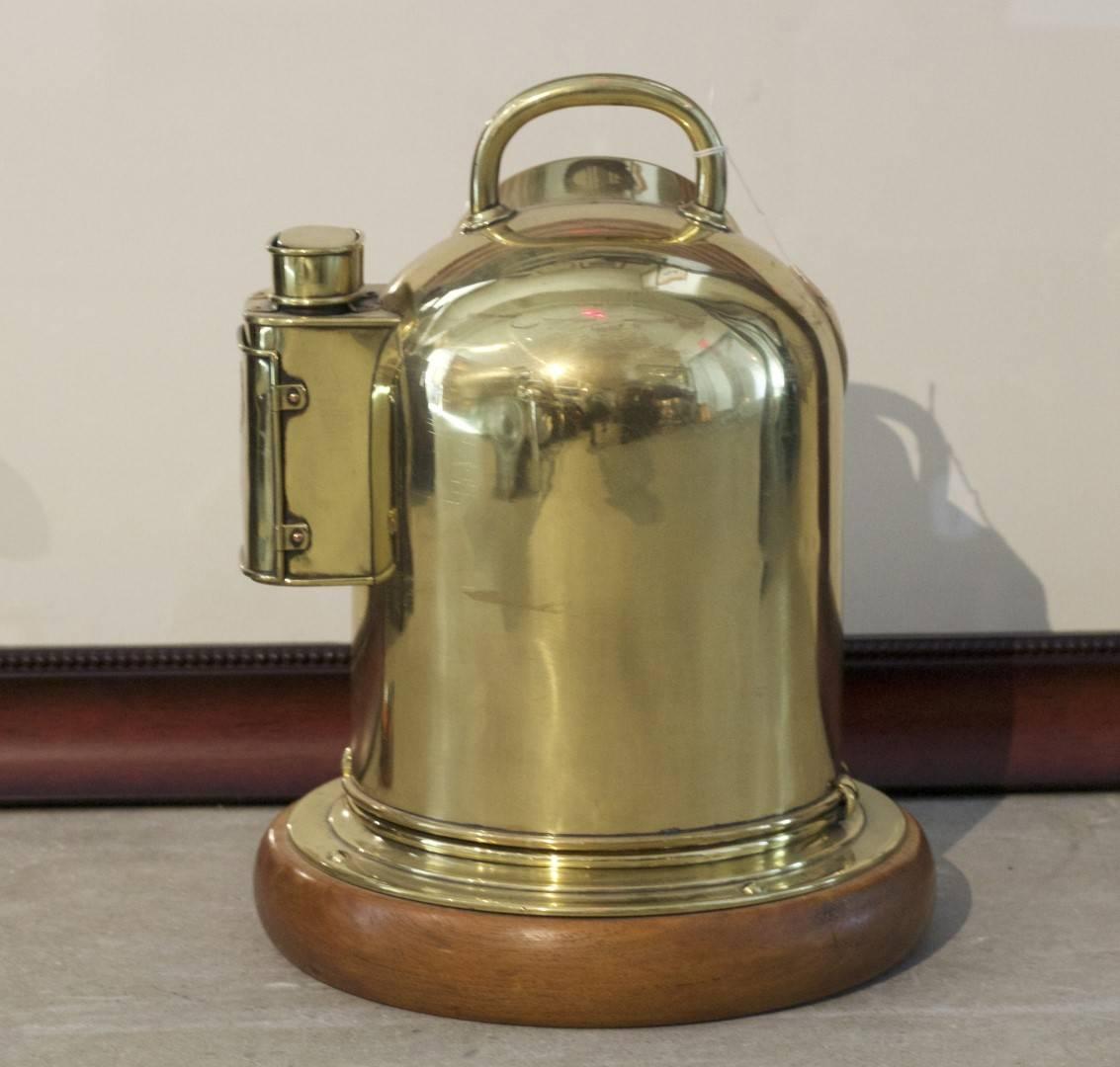 Antique brass yacht binnacle by Sestrel, mounted to a wood base. Dimensions: 16