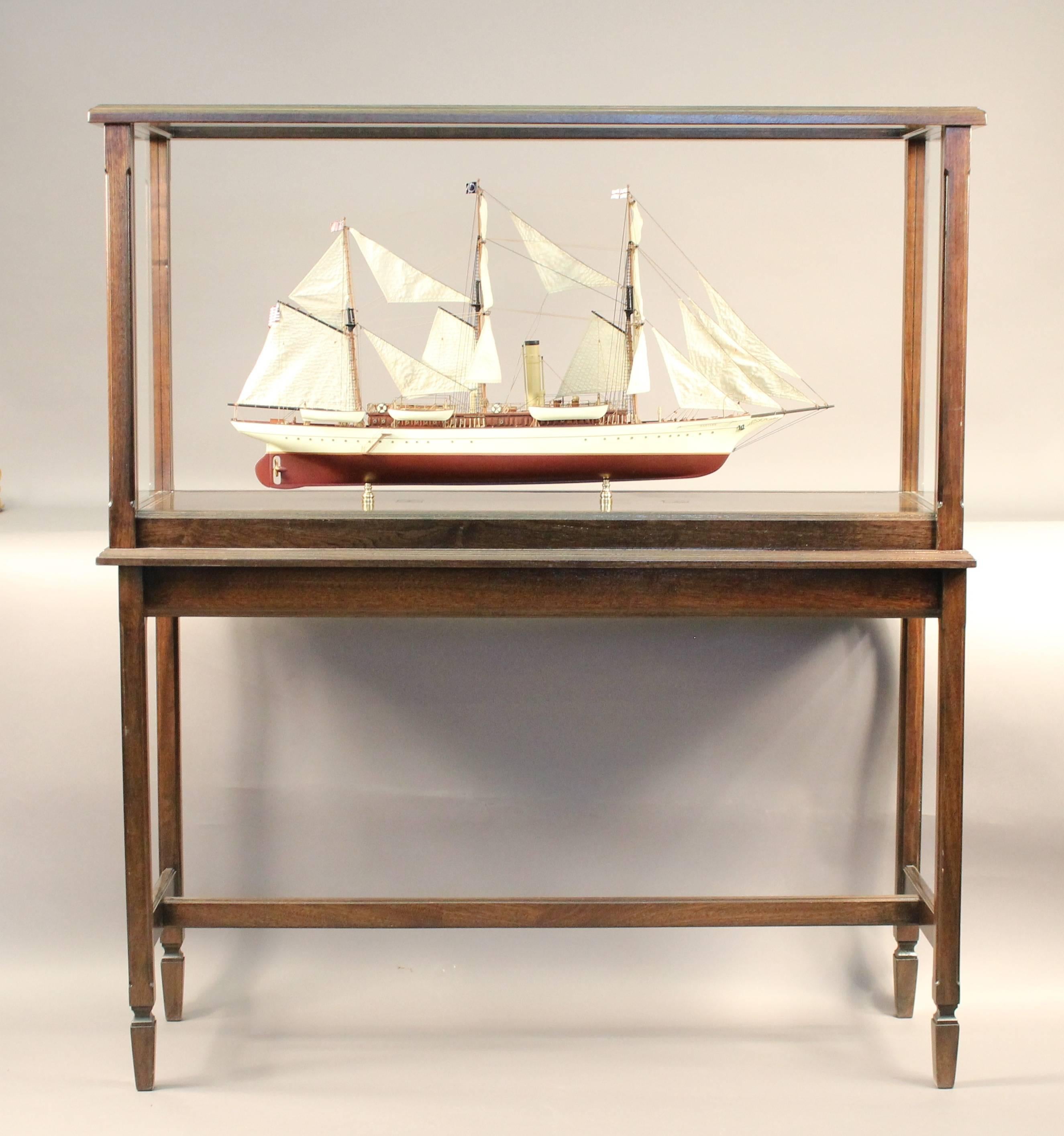 Expertly crafted model of George Baker's private steam yacht "Harvard". Baker founded the Harvard Business School in Cambridge and the Baker Library at Harvard University is named in his honor. The model has mahogany cabins with raised