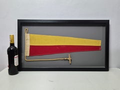Banderín de señal marítima enmarcado con el número uno