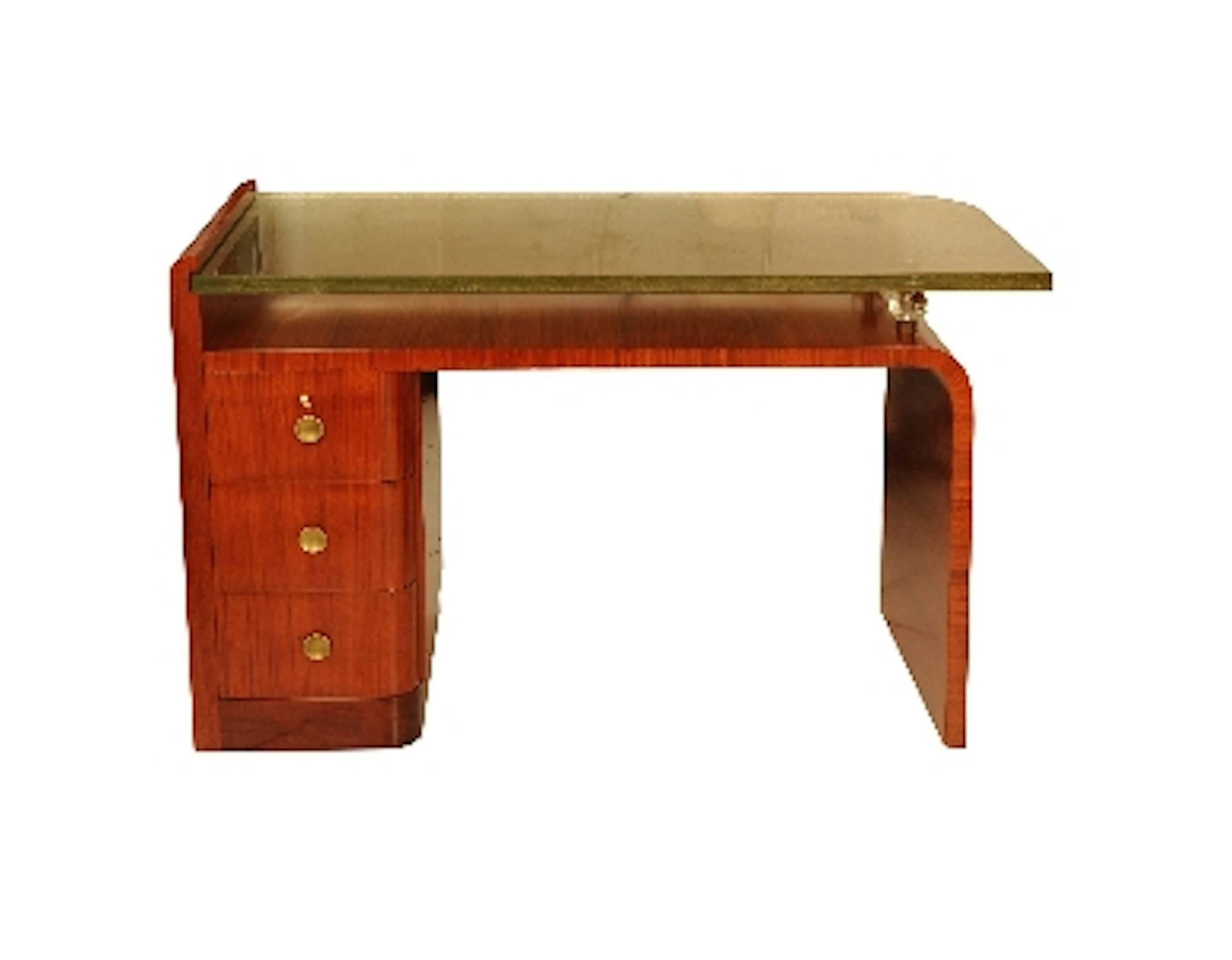 Rare Desk by Jacques Adnet. Tray and swivel shelf in thick Saint Gobain glass (sand bed), original.
Three drawers in front,
circa 1930.
In a perfect condition.