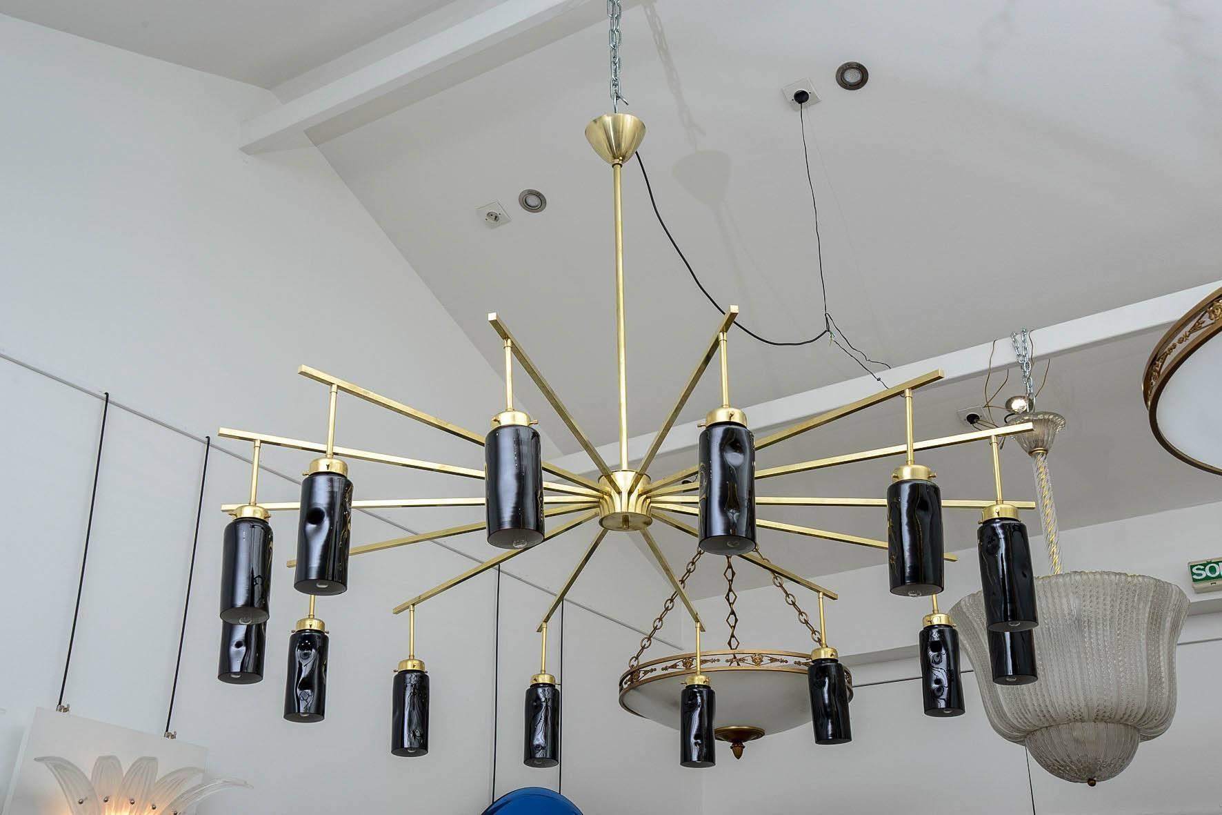 Spectacular 14 lamps spider pendant, in the taste of Stilnovo, in excellent condition.