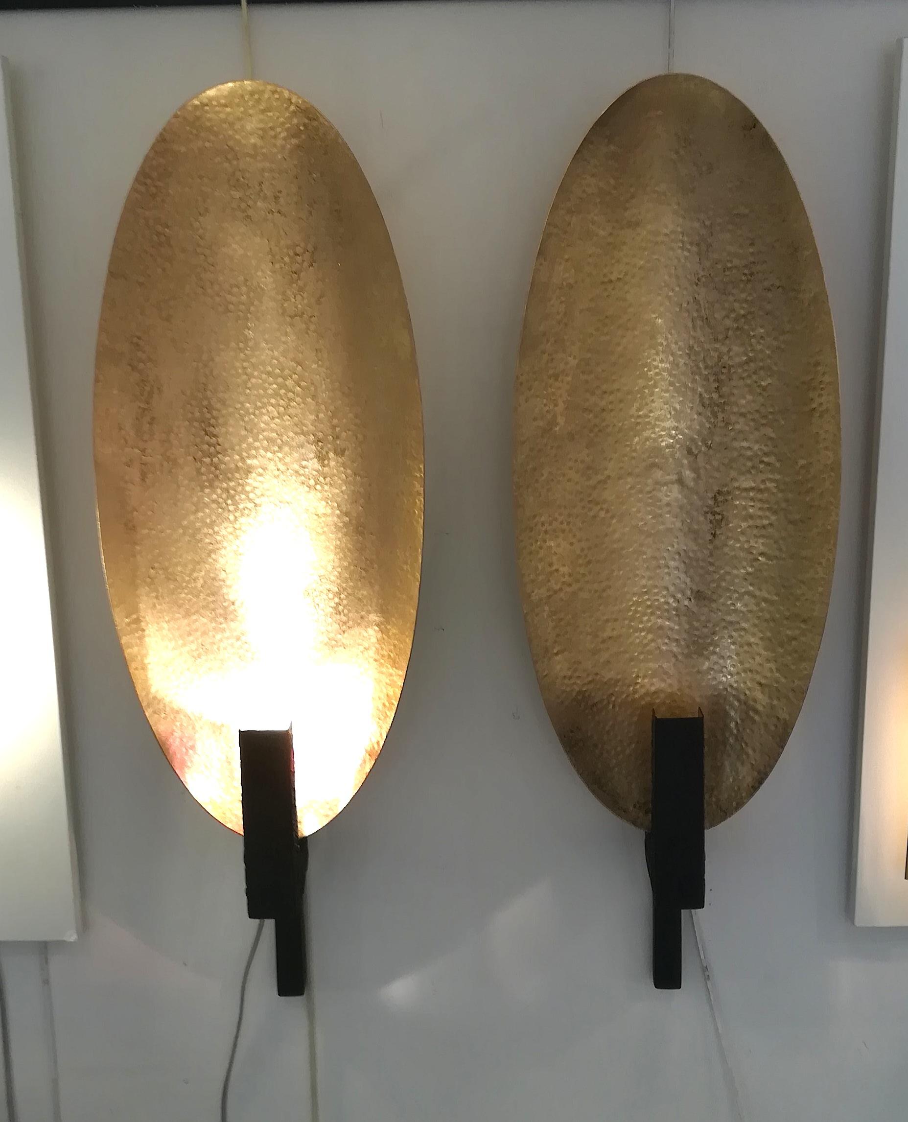 Pair of brass and black painted metal Ovale sconces.
(Can be sold separately upon request).