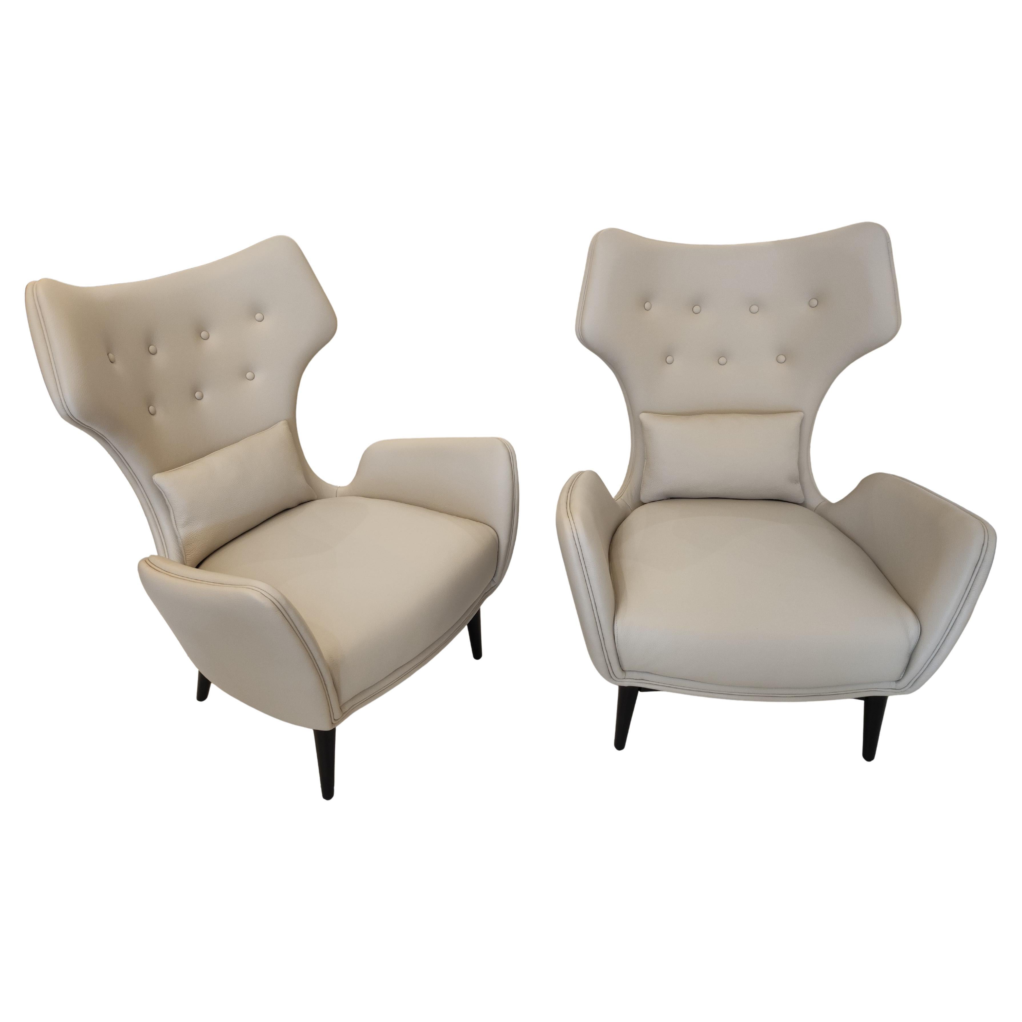 Pair of French greige Leather Armchairs For Sale