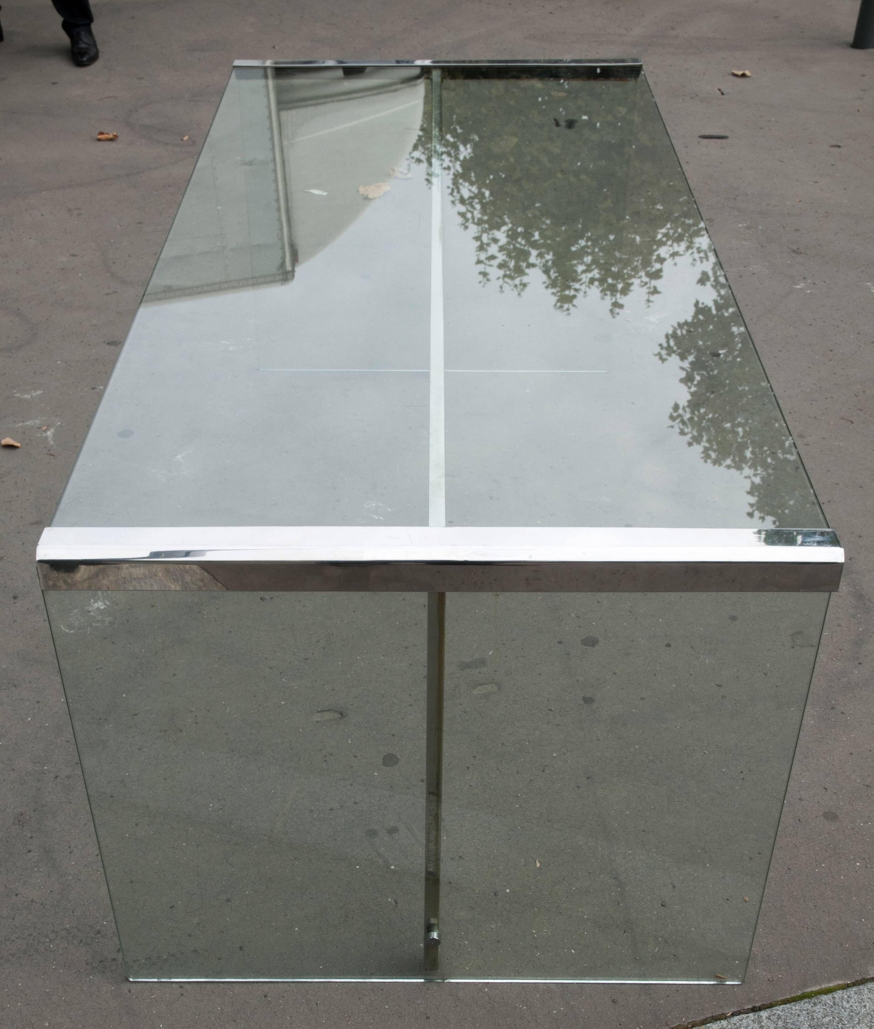 Large table desk in white glass and nickel plated brass.
circa 1970.