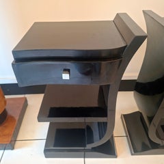 Pair of Art Deco, circa 1930, black lacquered wood night stands