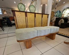 Bench 3 seats in wood and light green heathered fabric.
