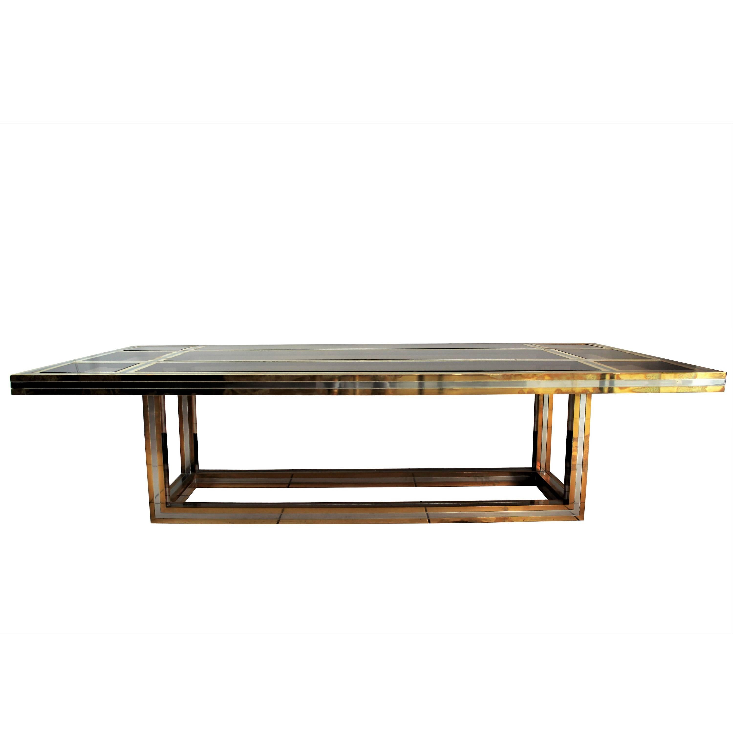 Large coffee table by Romeo Rega in chrome and brass. Spacers in glass smoked.
Original condition.
circa 1970.
More images available upon request.