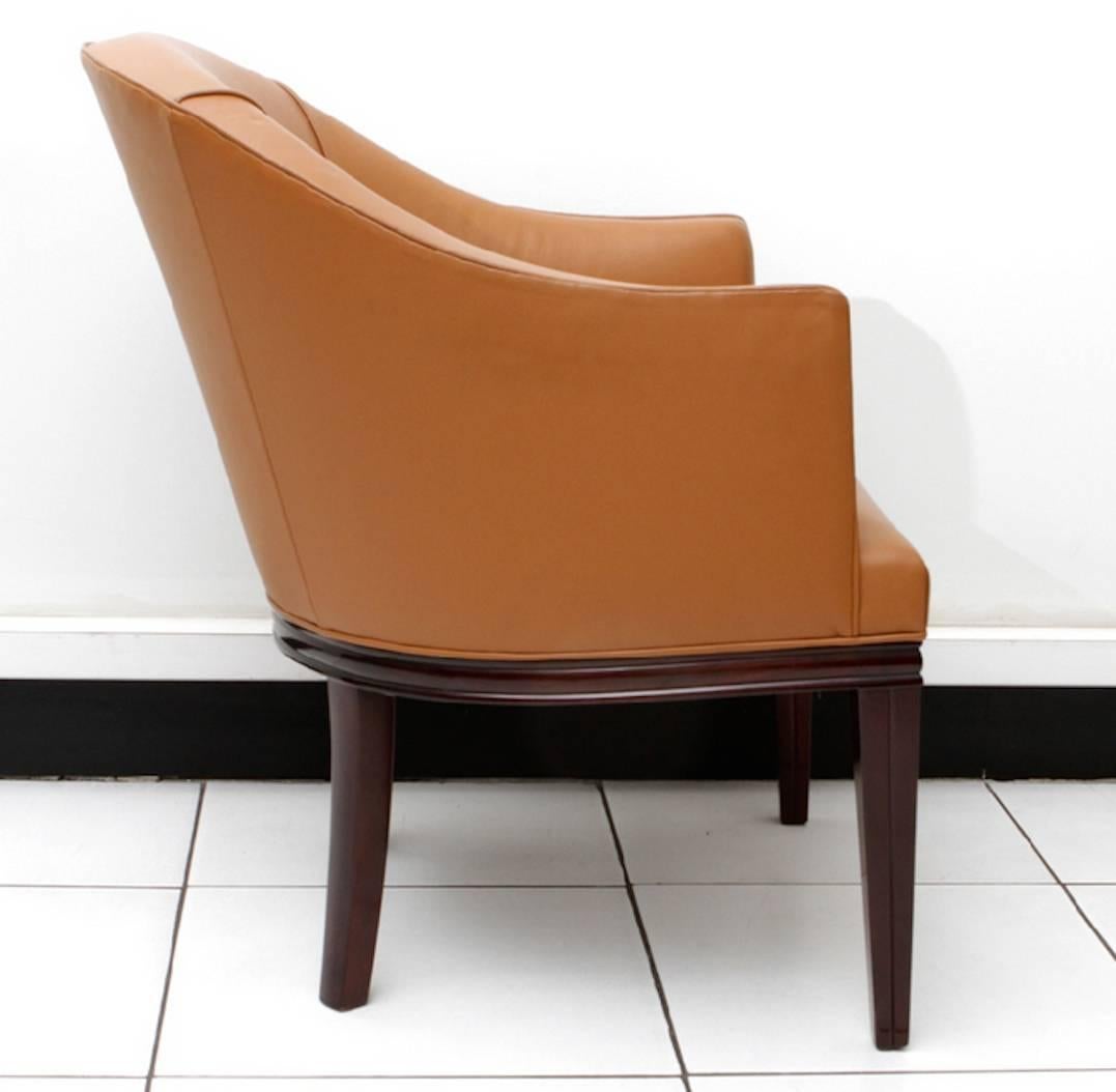 Mahogany office armchair, covered with leather Havana.

D.I.M René Joubert (1885-1931) et Philippe Petit (1885-1945).

D.I.M. (Décoration Intérieure Moderne).
 