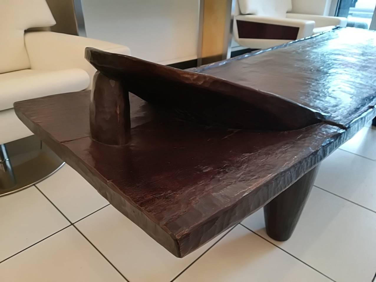 Spectacular Senoufo ( Ivory Coast ) End of 19th century bench, cut in a single piece of wood              ( Monoxile), can be used as a low table.