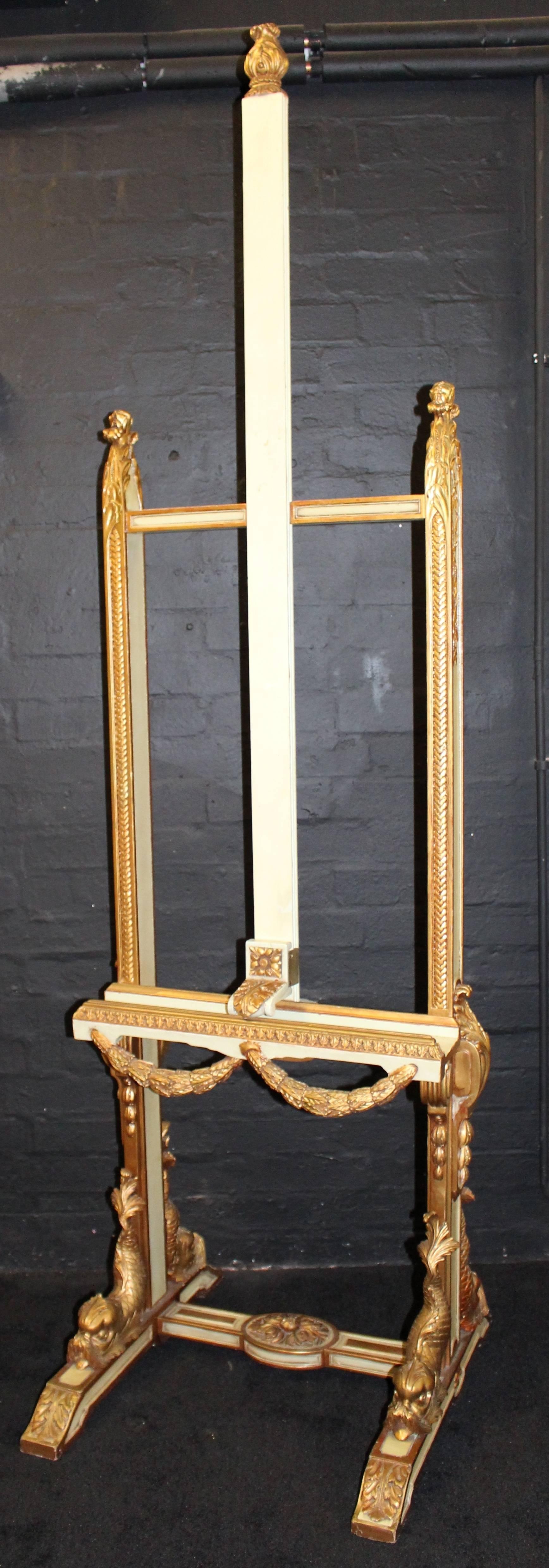 

Measures: Width 64 cm 25 1/4 in.
Depth 60 cm 23 1/2 in.
Height 277 cm 9 ft 1 in.

Artist's Easel.
Style French.
Composition carved wood.
Finish French style, painted with gilt decoration.
Condition Very good condition. Minor marks