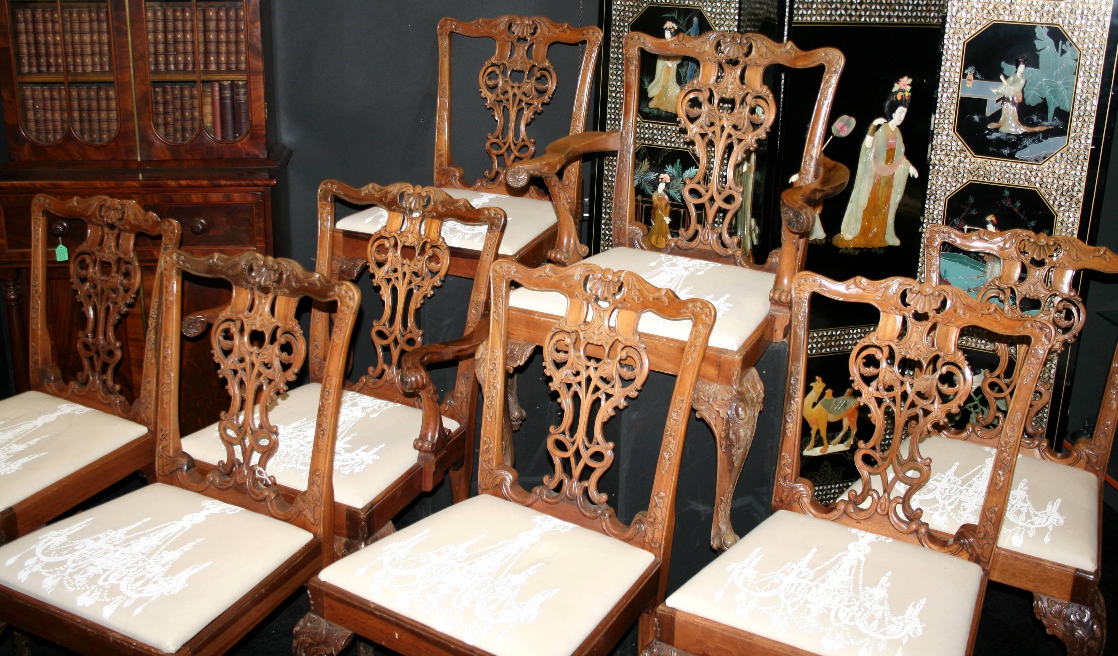 

Height (to top rail) 94 cm 37 in.
Height (to seat) 48 cm 19 in.

Set of eight dining chairs.
Style Chippendale.
Wood mahogany.
Seats upholstered.
Condition good condition. Some scratches to frames commensurate with age, some stains to