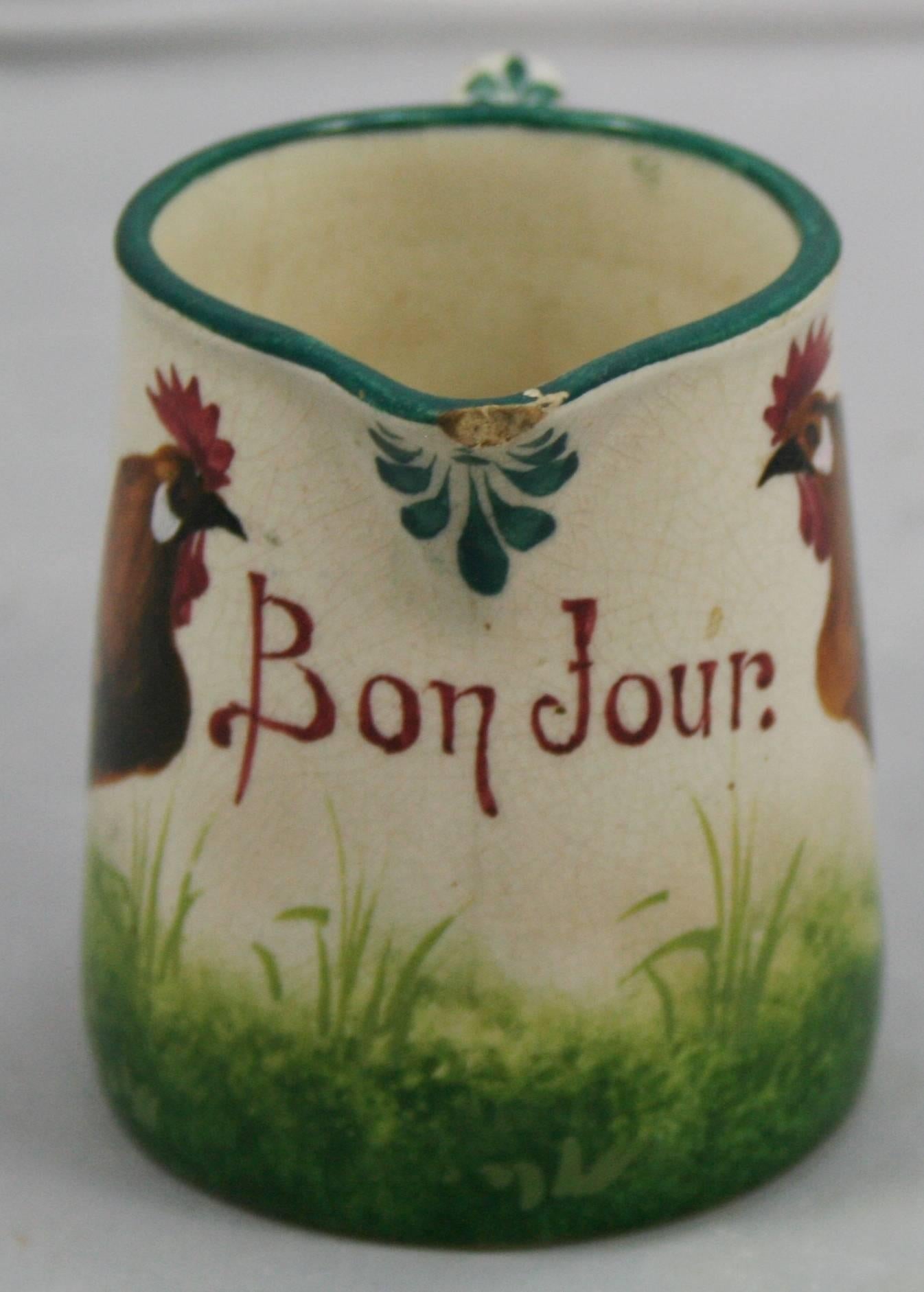 

Manufacturer Wemyss.
Date circa 1900.
Measures: Height 7 cm / 2 3/4 in.
Composition pottery.
Decoration painted with opposed brown cockerels. Bearing inscription 'Bonjour'.
Backstamp impressed mark to base Wemyss ware.
Condition good