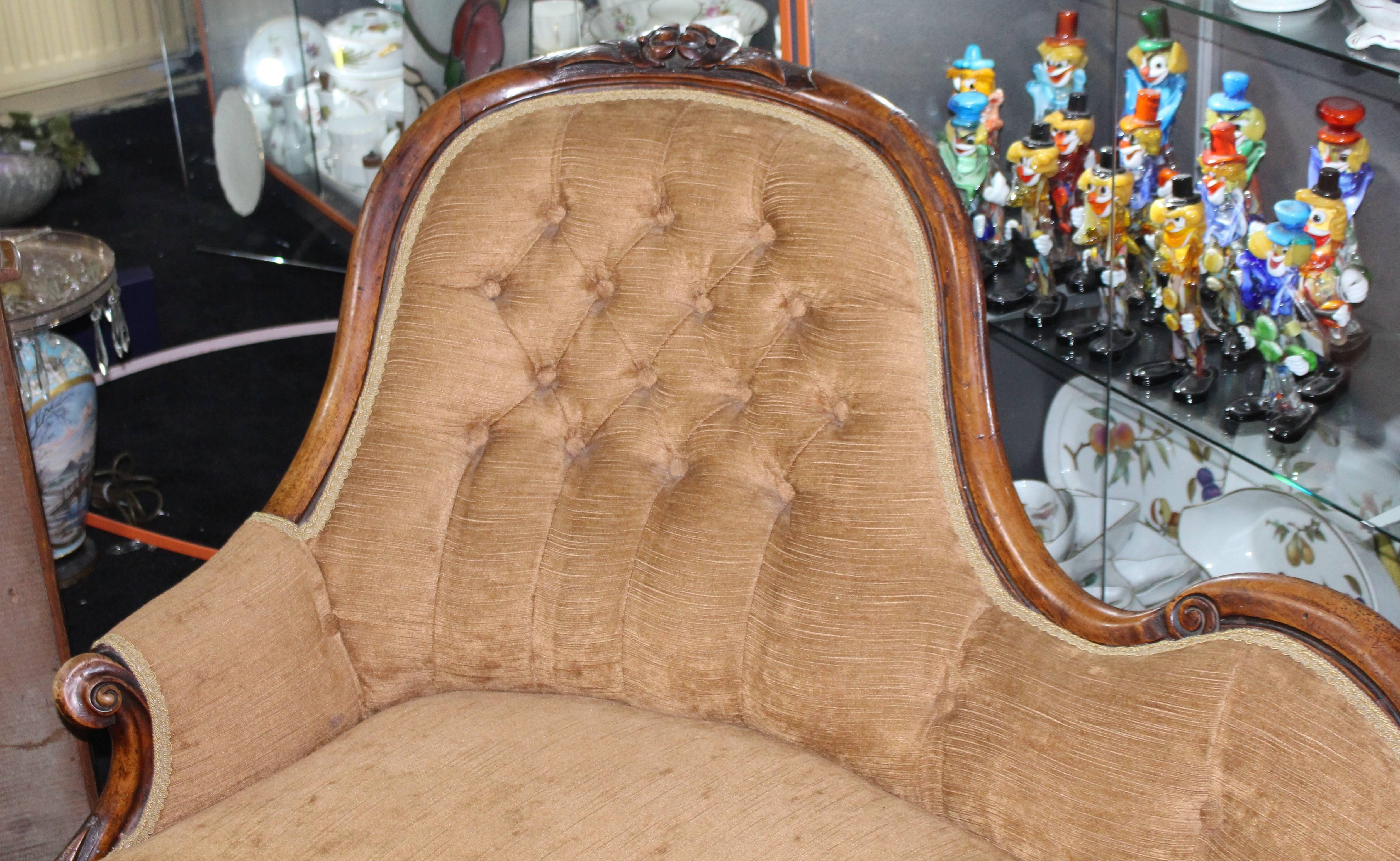Measures: Length 166 cm 65 1/2 in.
Width 90 cm 35 1/2 in.
Height 86 cm 34 in.

Period 19th century.
Frame walnut.
Upholstery upholstered approximately 12 months ago in an antique style gold chenille fabric, button-back. 
Condition Very good