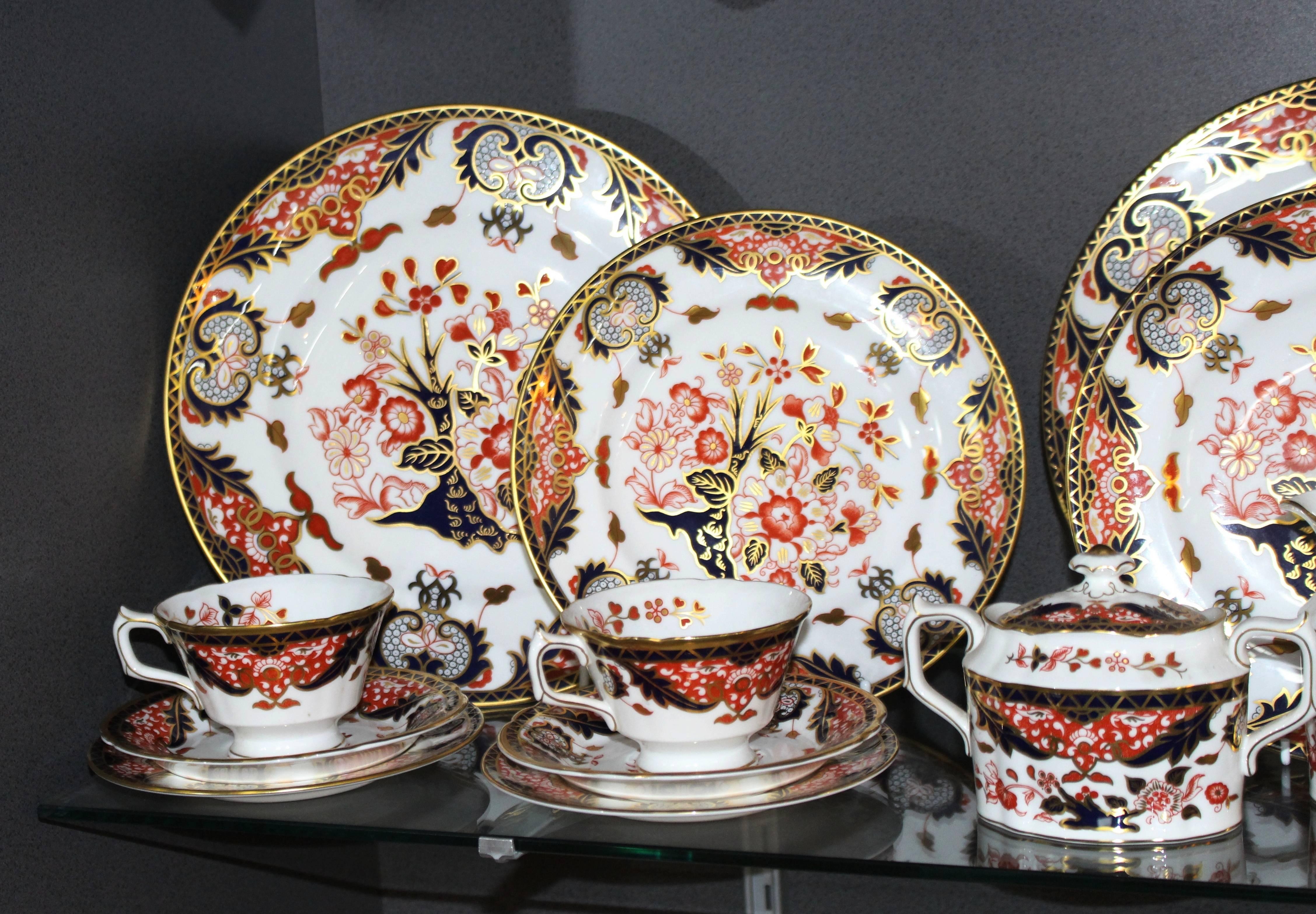 

Manufacturer Royal Crown Derby
Pattern Derby Japan
Total 32 Pieces
Pieces Everything pictured: Six dinner plates, six tea plates, six side plates, six tea saucers, five tea cups, two handled sugar bowl with lid, cream jug
Backstamp Fully
