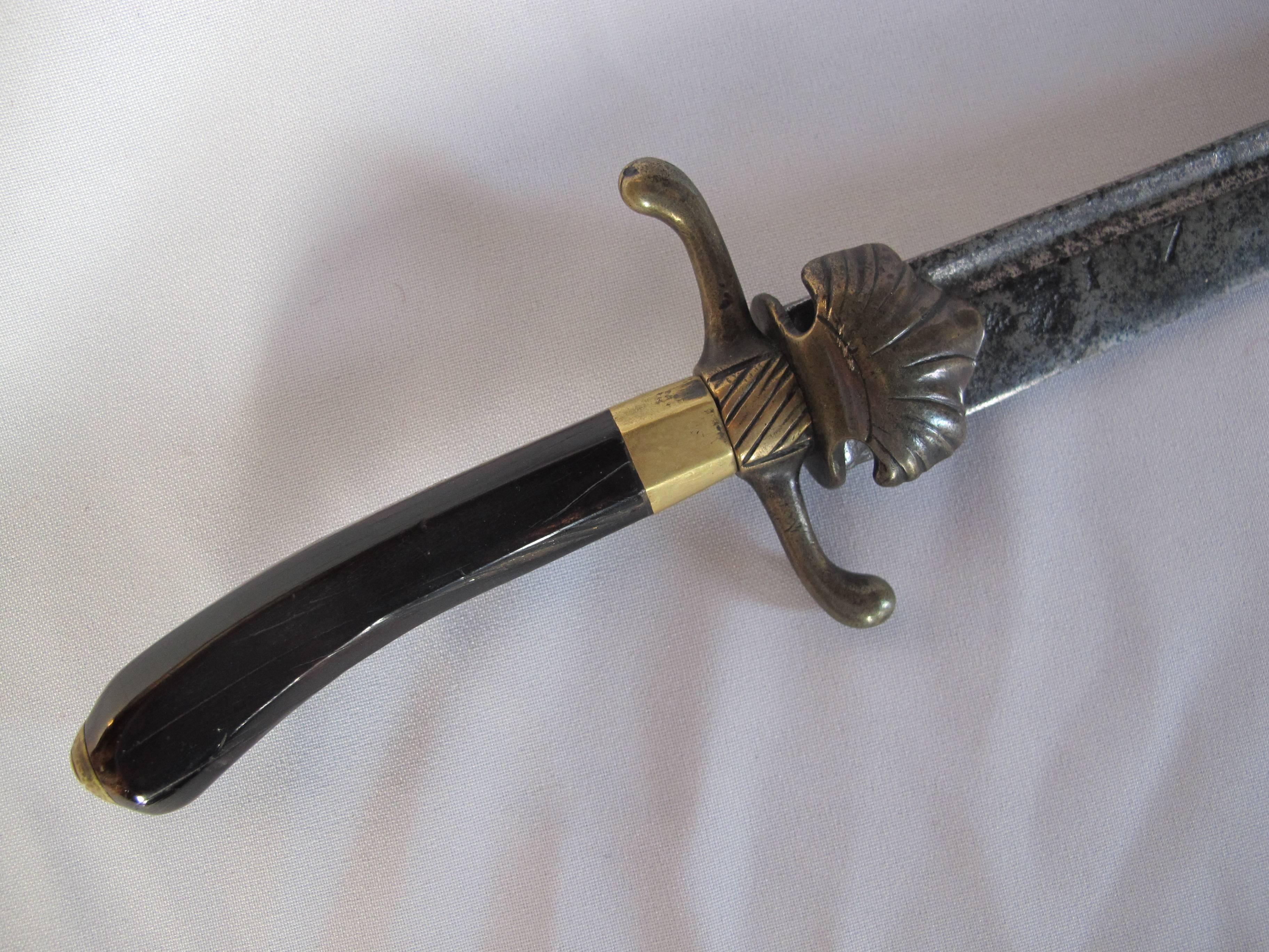 A fine Dutch VOC sword or saber. Dated on both sides '1728'.  With VOC monogram and 'A' for Amsterdam.

Long 58 cm.