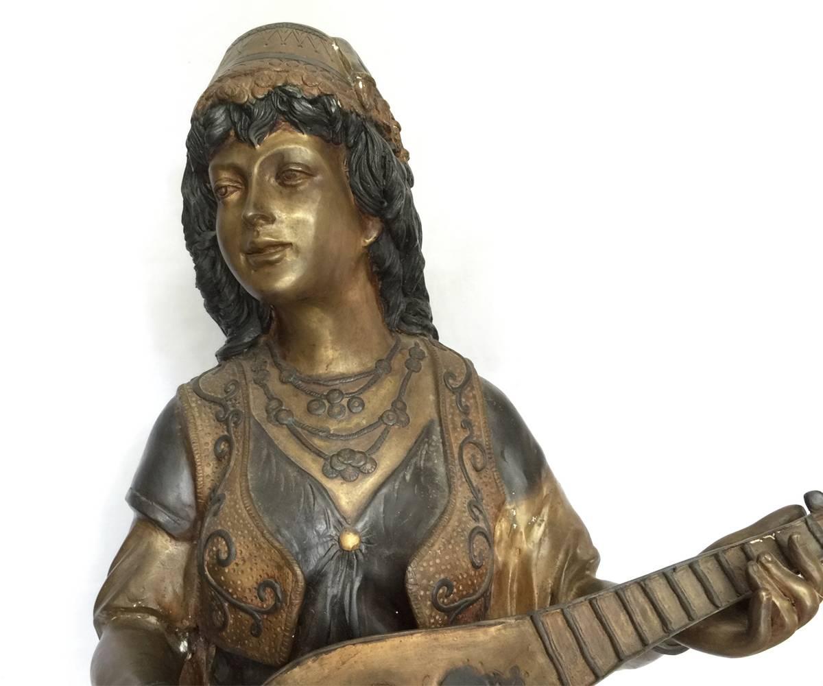 European Bronze Female in the Orientalism Style Playing an Instrument
