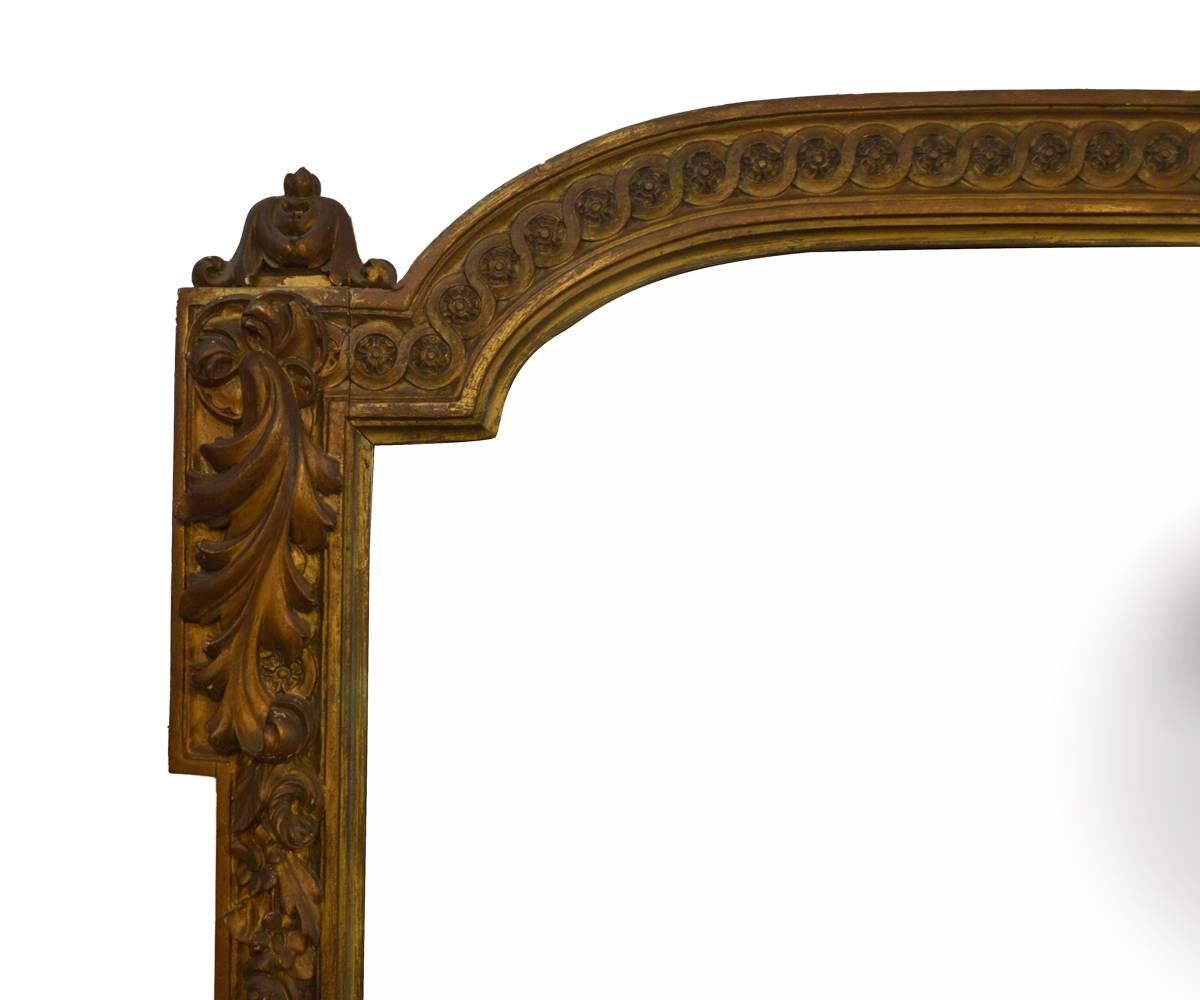 This is mid-19th century French gilded mirror that is of superb quality and the shallow shelf which truly increases its functionality. The gilding is originally the craftsmanship is wonderful.