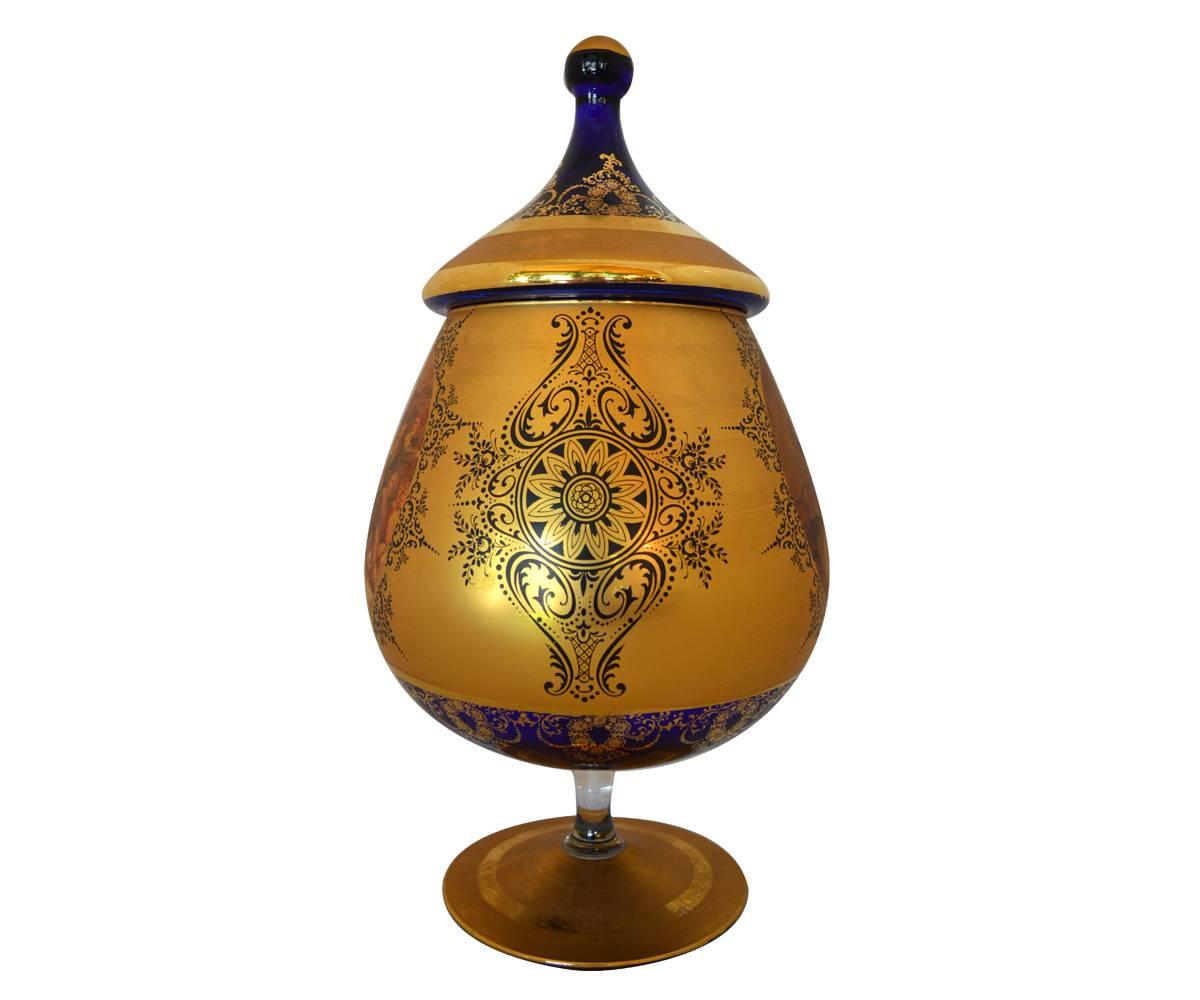 This is a magnificent hand-painted with 24-karat gold urn with an orientalism theme. Both sides of the urn are well painted with a battle scene. The amount of 24-karat paint is rarely seen on a piece lending to it’s significance.