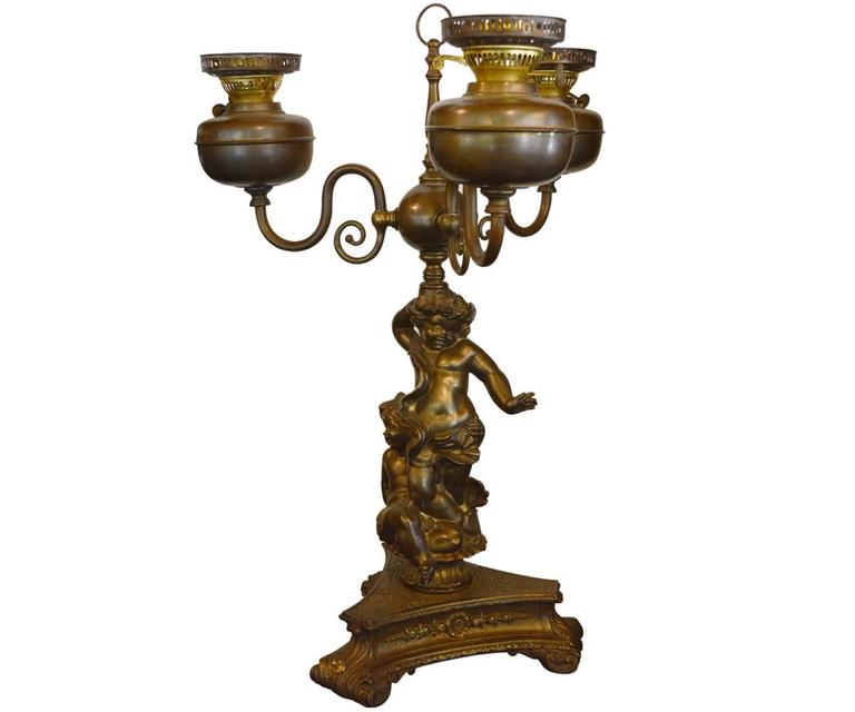 Pair Of Antique Cherub Oil Lamps Converted To Electric At 1stdibs Offered Is A Beautiful Pair Of Antique Oil Lamps That Have Been Converted To Electric