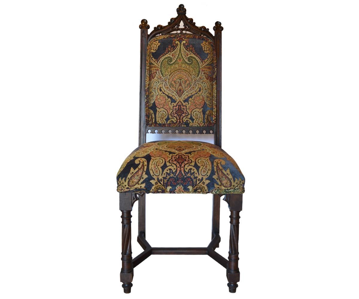 This is a fantastic antique Gothic dining table with eight chairs that has been fully refurbished and reupholstered with European fabric. This French piece and is hand-carved walnut. This table comes with three additional leafs of 18