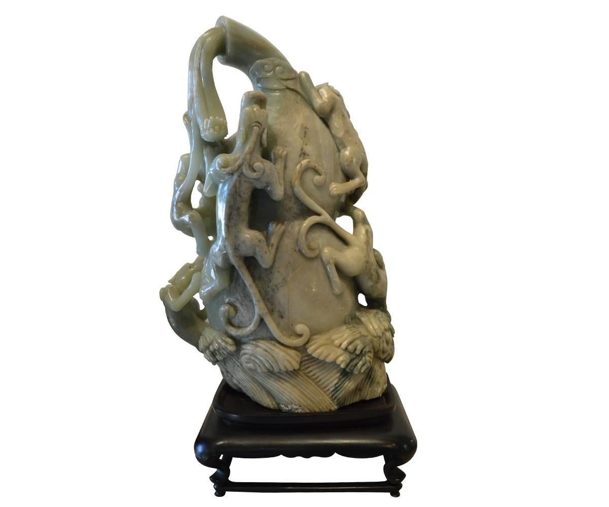 This is a magnificent carved Chinese celadon jade figure of immense size. Note that the sizes are for the jade only, not the Stand. The quality of jade, the size of the piece, the subject matter and the workmanship make this an extremely rare piece