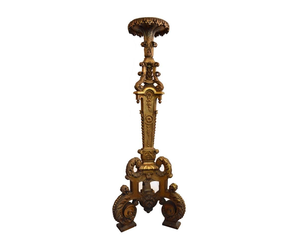 This intricate candle stand/torchiere is of size that it can easily be used as a pedestal or in its more traditional role.