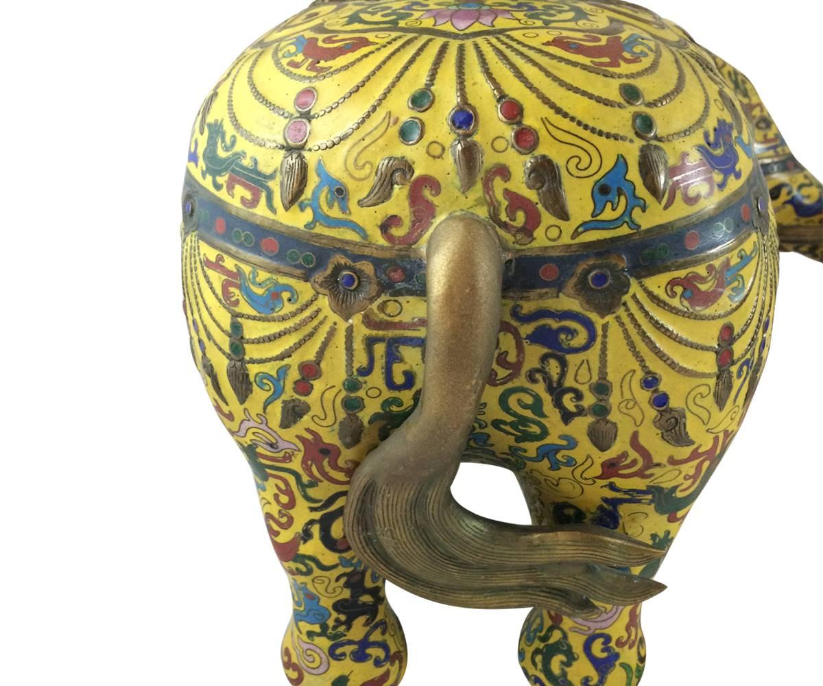 These elephant treasures are truly mesmerizing and will be the focal point of any room. The candle holders date from the late 19th century to the early 20th century and show wear commensurate with their age. They are multi color with yellow being