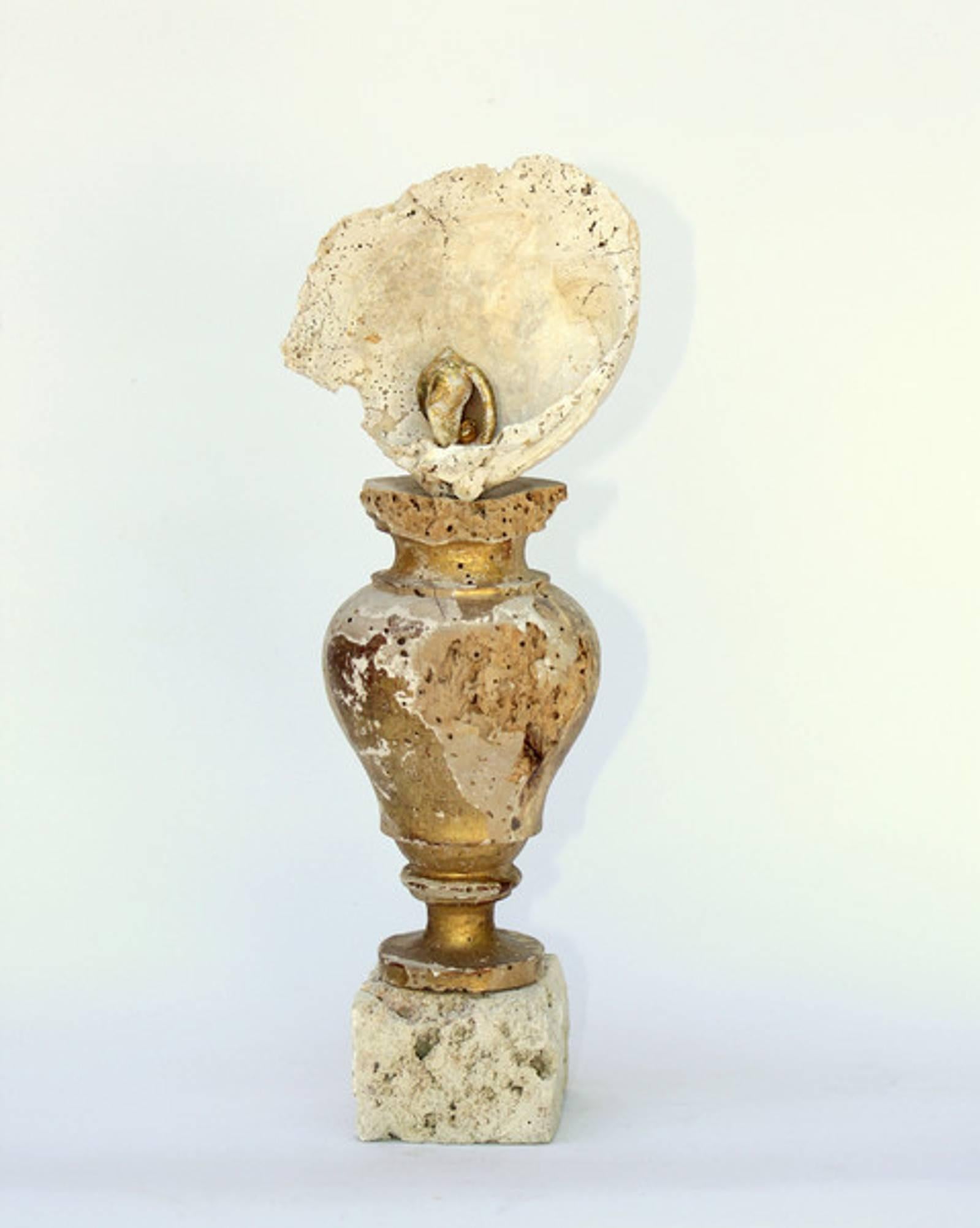 This is an 18th century gold leaf Italian distressed church vase that's been decorated with a distressed fossil shell on a rock coral base. Great art accessory for any room!