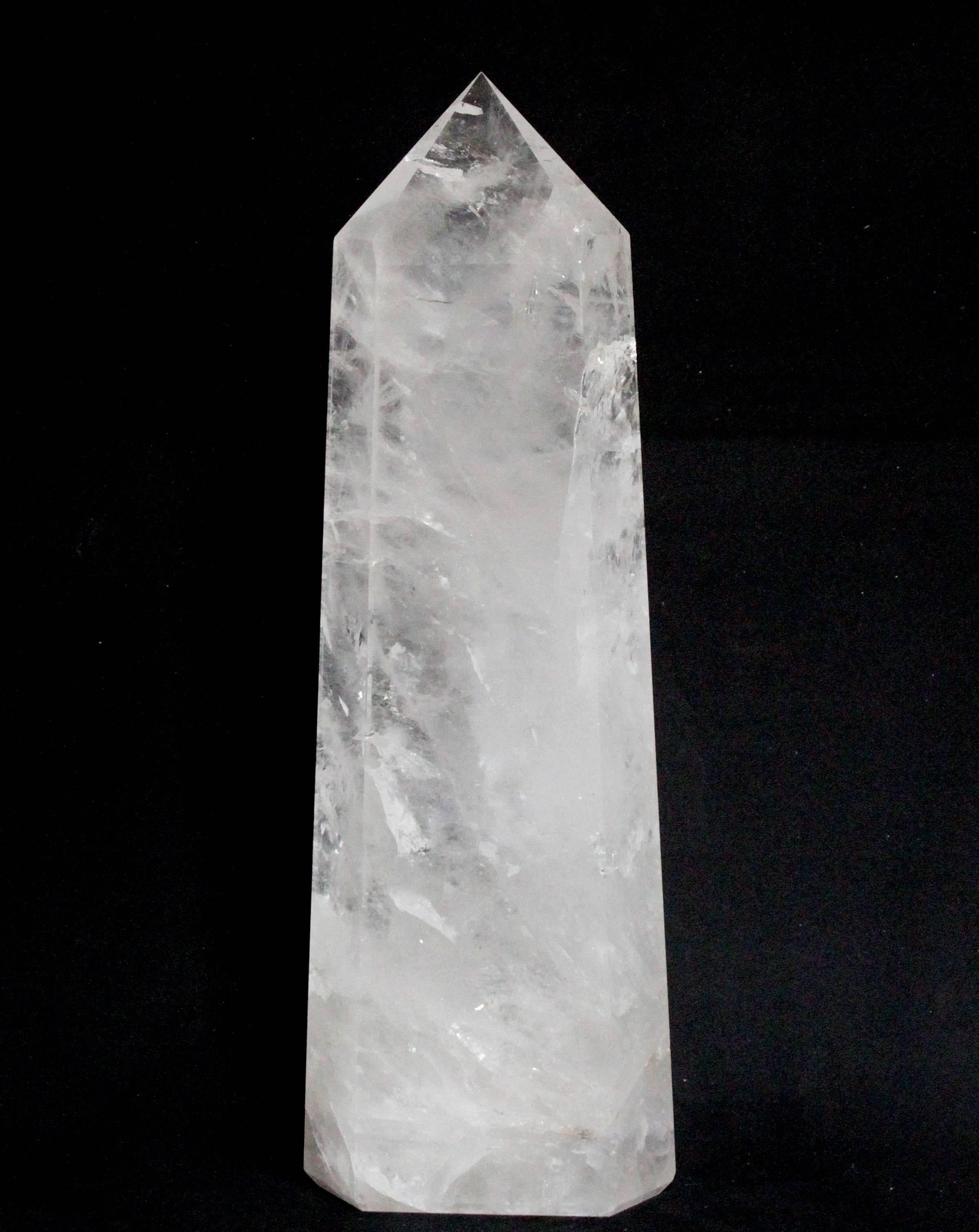 Large crystal point that has been cut and polished into an obelisk. 

Weight: 12.2 lbs.