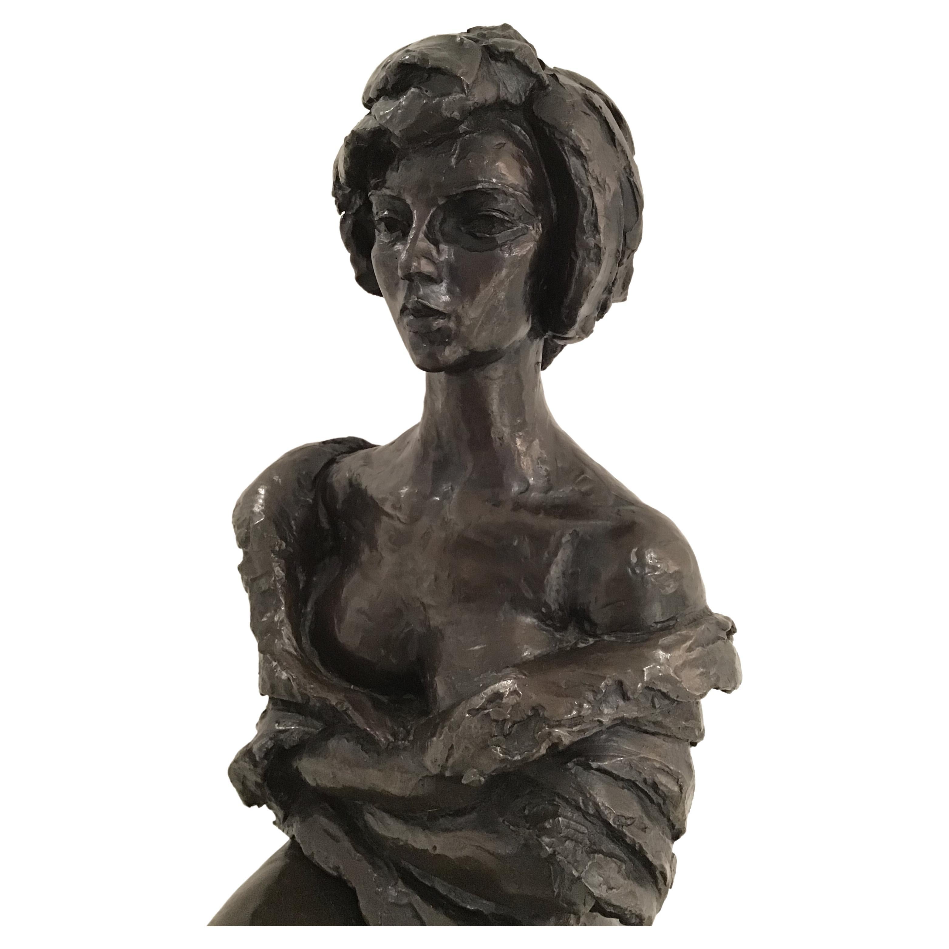 Magnificent patinated bronze sculpture on black marble base by American sculptor Charles Umlauf, signed, circa 1970.
Sculpting portrait of a seated woman. 
Umlauf was one of the premier sculptors in Texas in the second half of the 20th century,